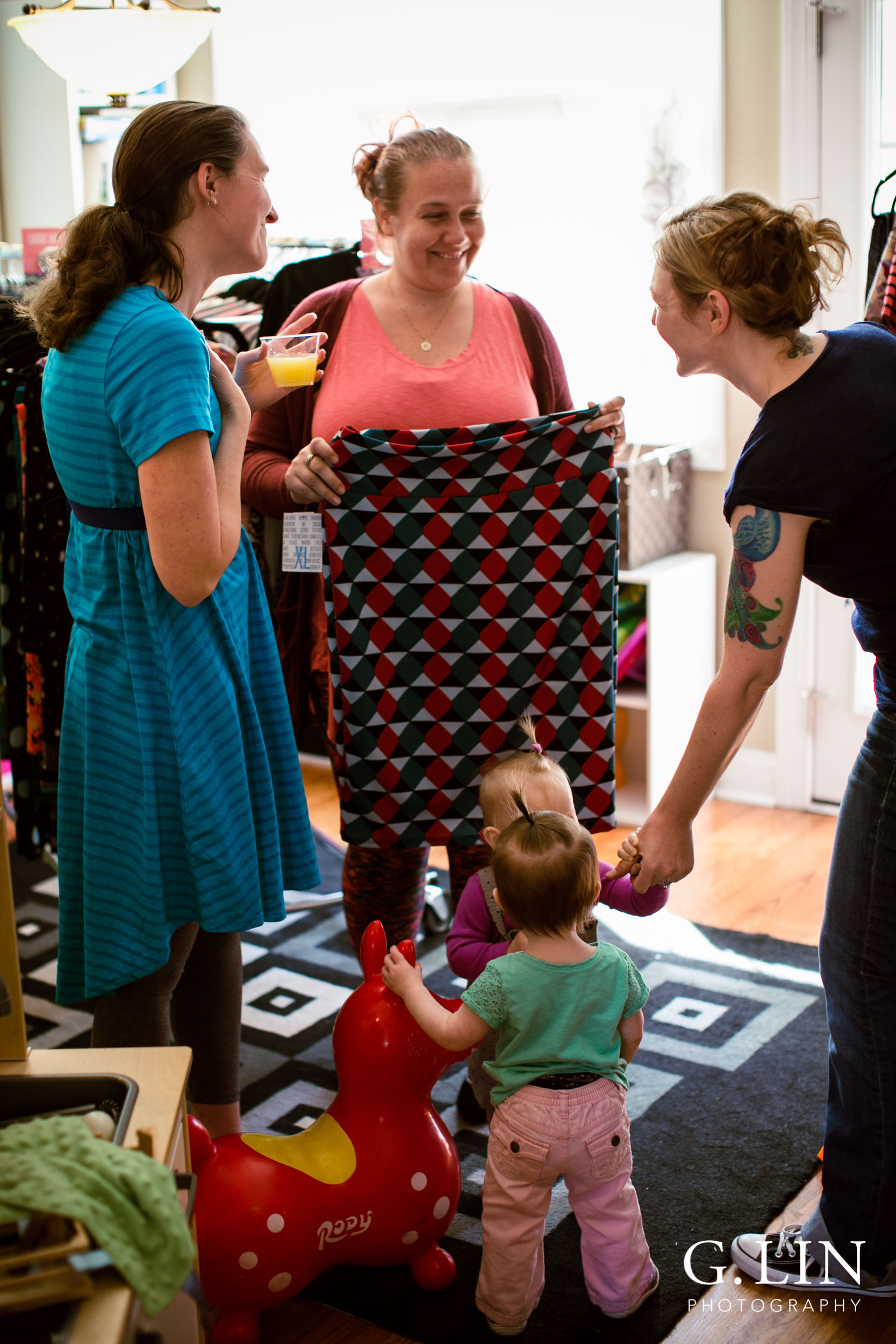 Raleigh Event Photographer | G. Lin Photography | Women laughing and talking inside home