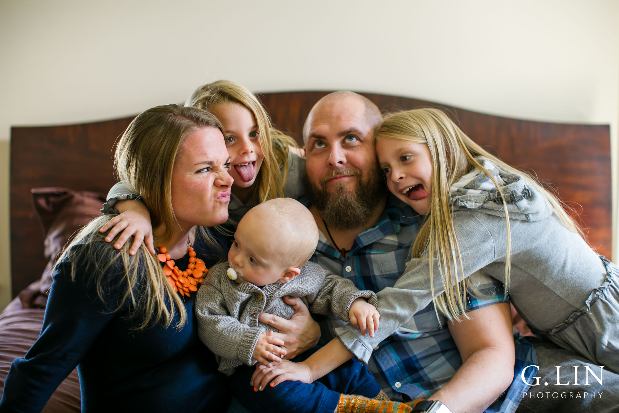 Silly faces made by family for portrait session