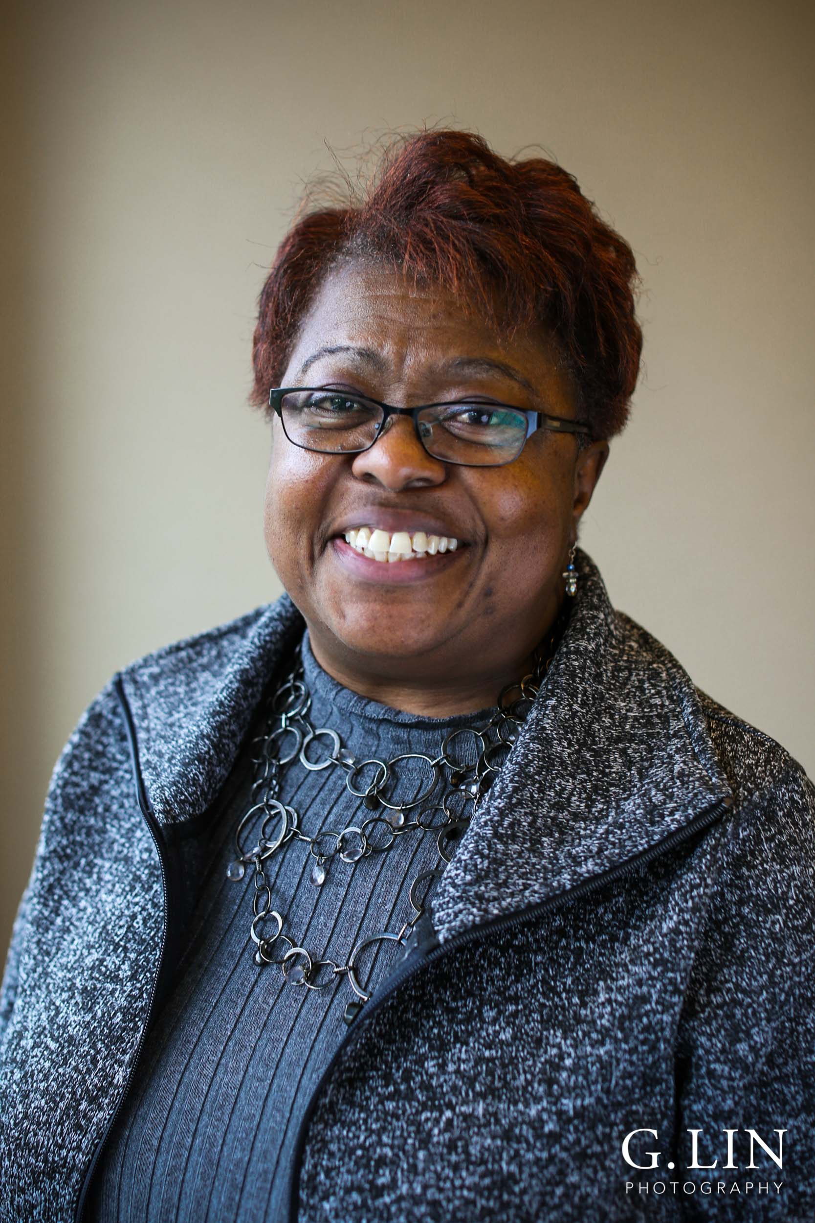 Raleigh Event Photographer | G. Lin Photography | Female participant smiling at camera for portrait