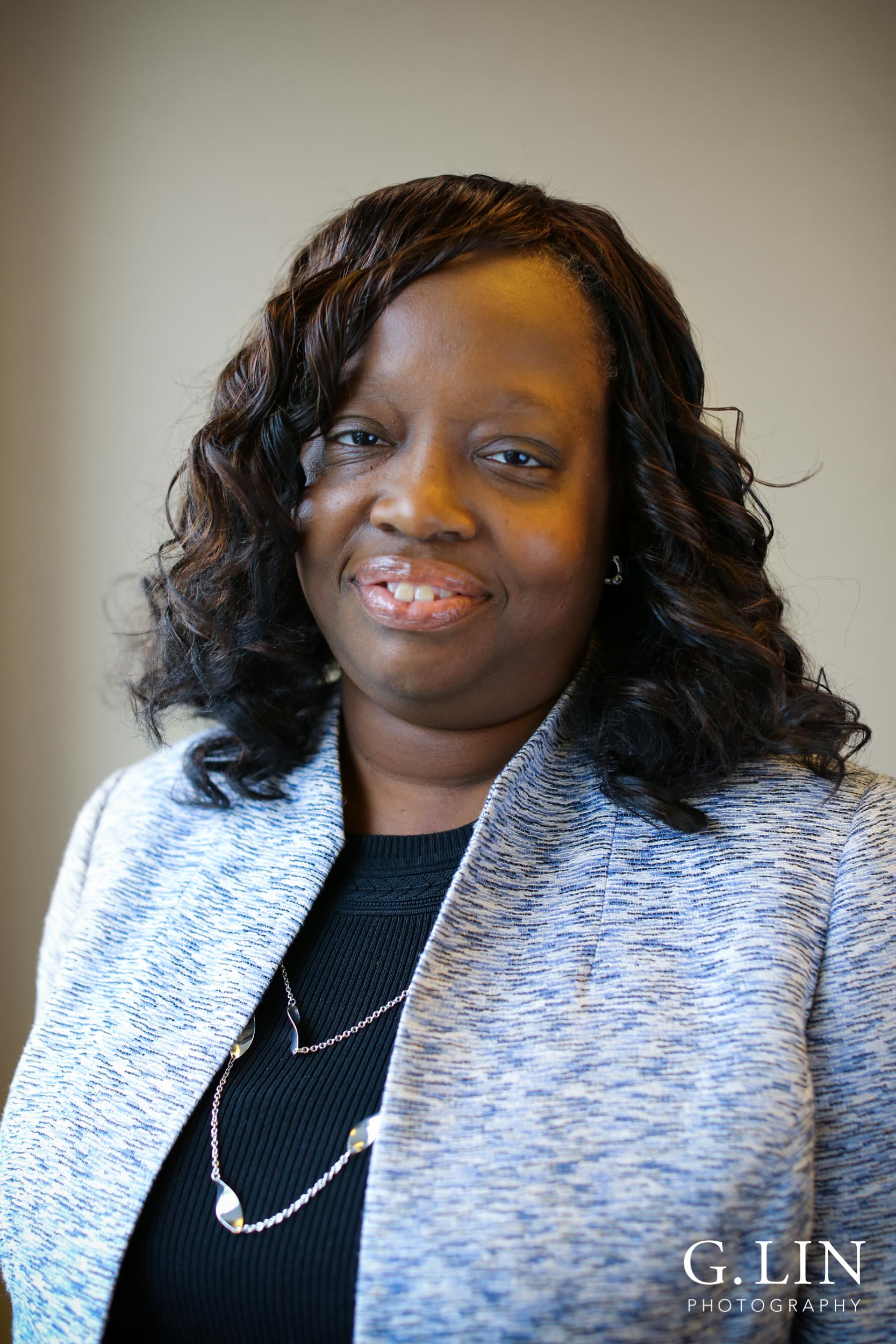 Raleigh Event Photographer | G. Lin Photography | Female participant smiling at camera for portrait