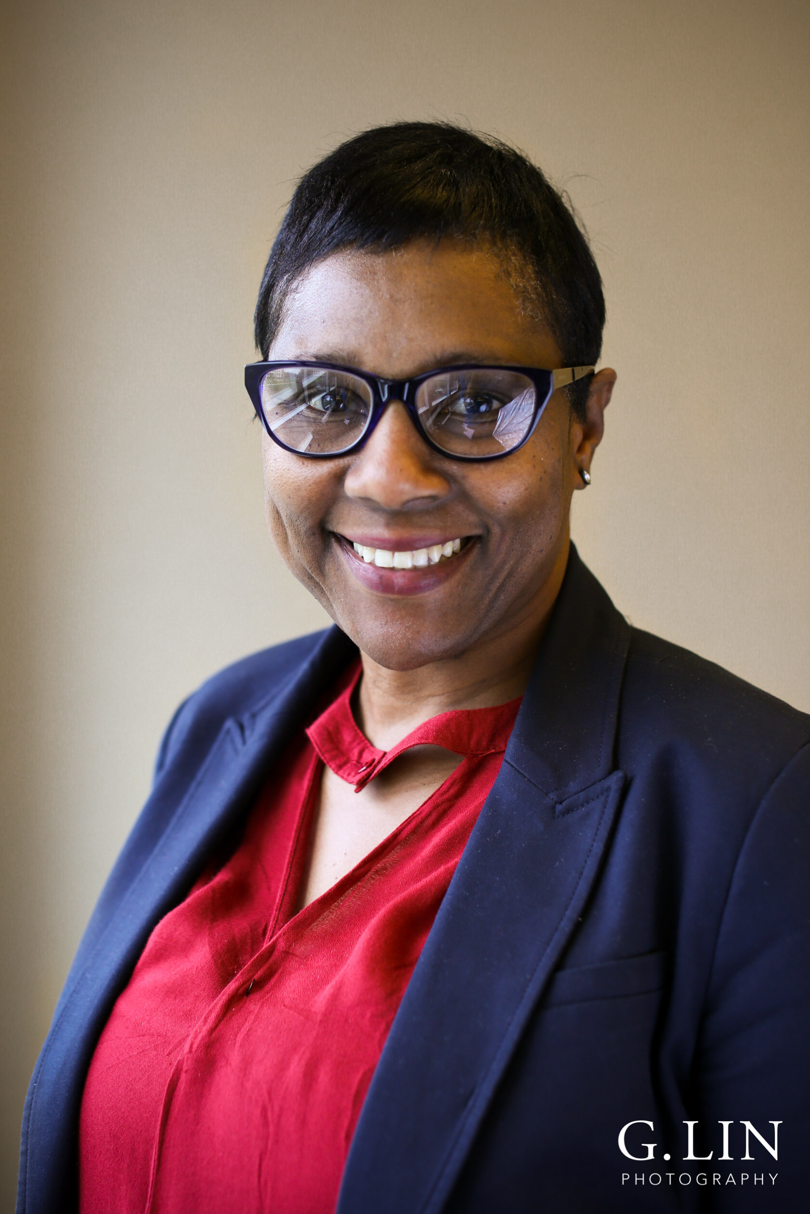 Raleigh Event Photographer | G. Lin Photography | Female participant smiling at camera for portrait head shot