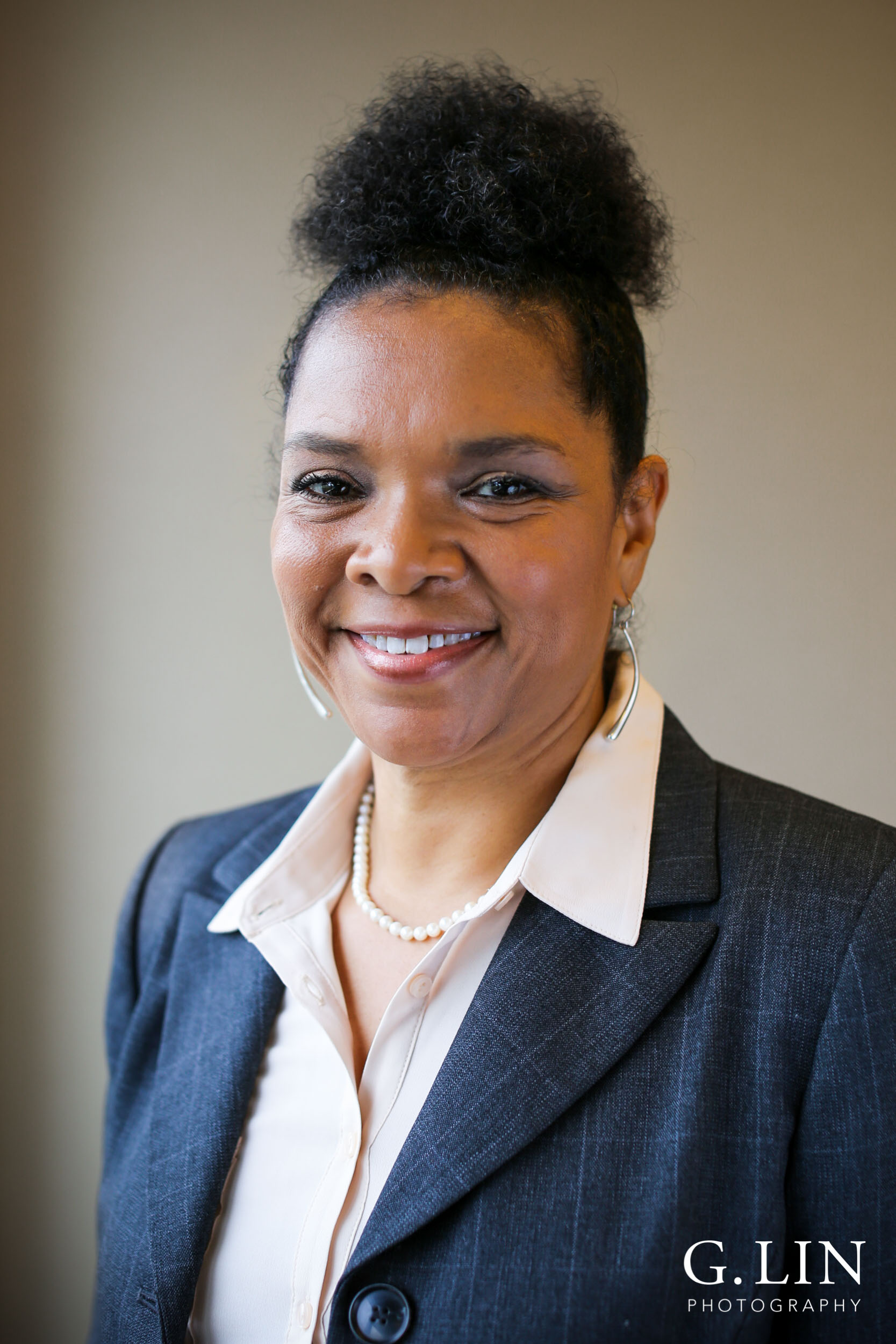 Raleigh Event Photographer | G. Lin Photography | Female participant smiling at camera for portrait head shot