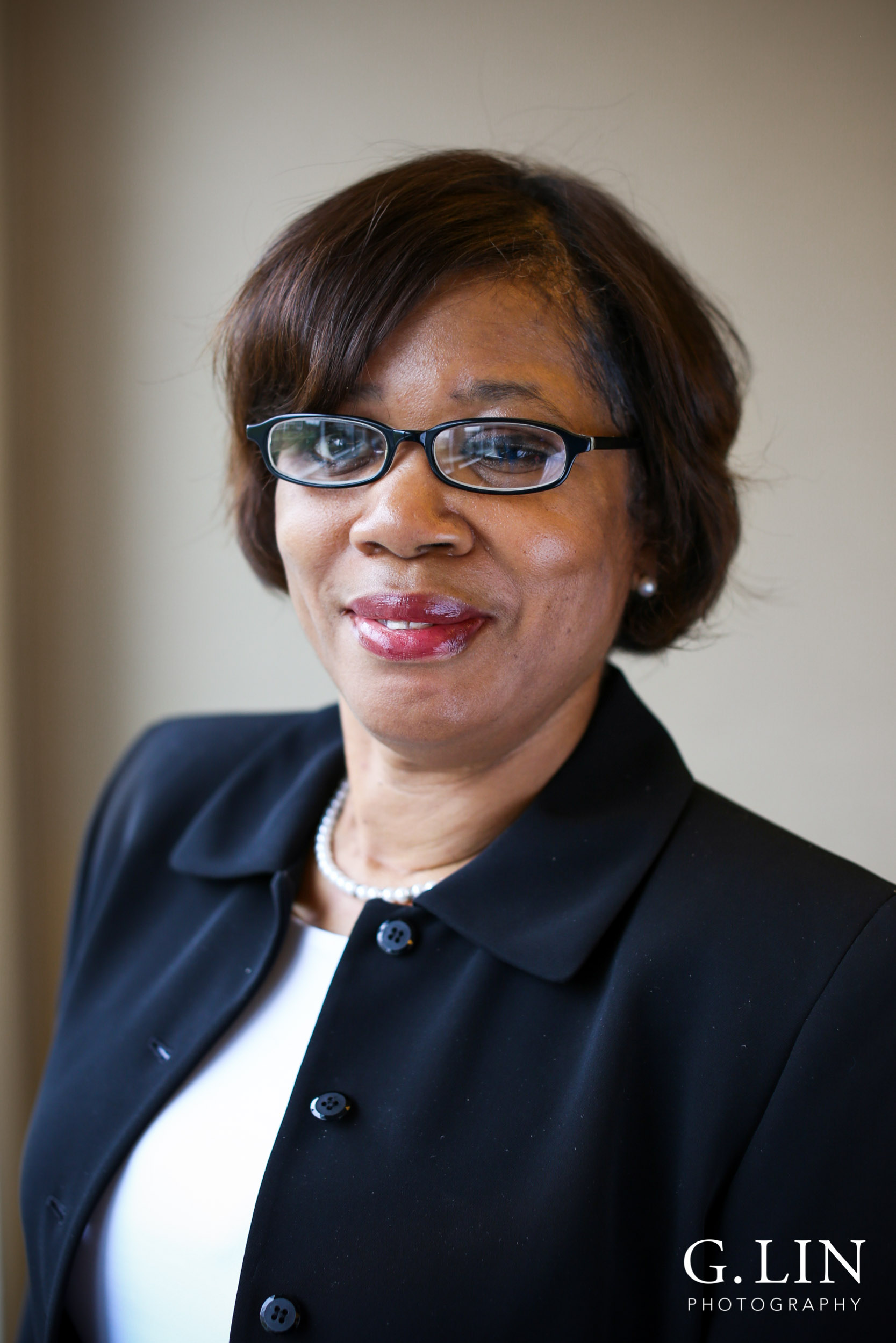 Raleigh Event Photographer | G. Lin Photography | Female participant smiling at camera for portrait head shot