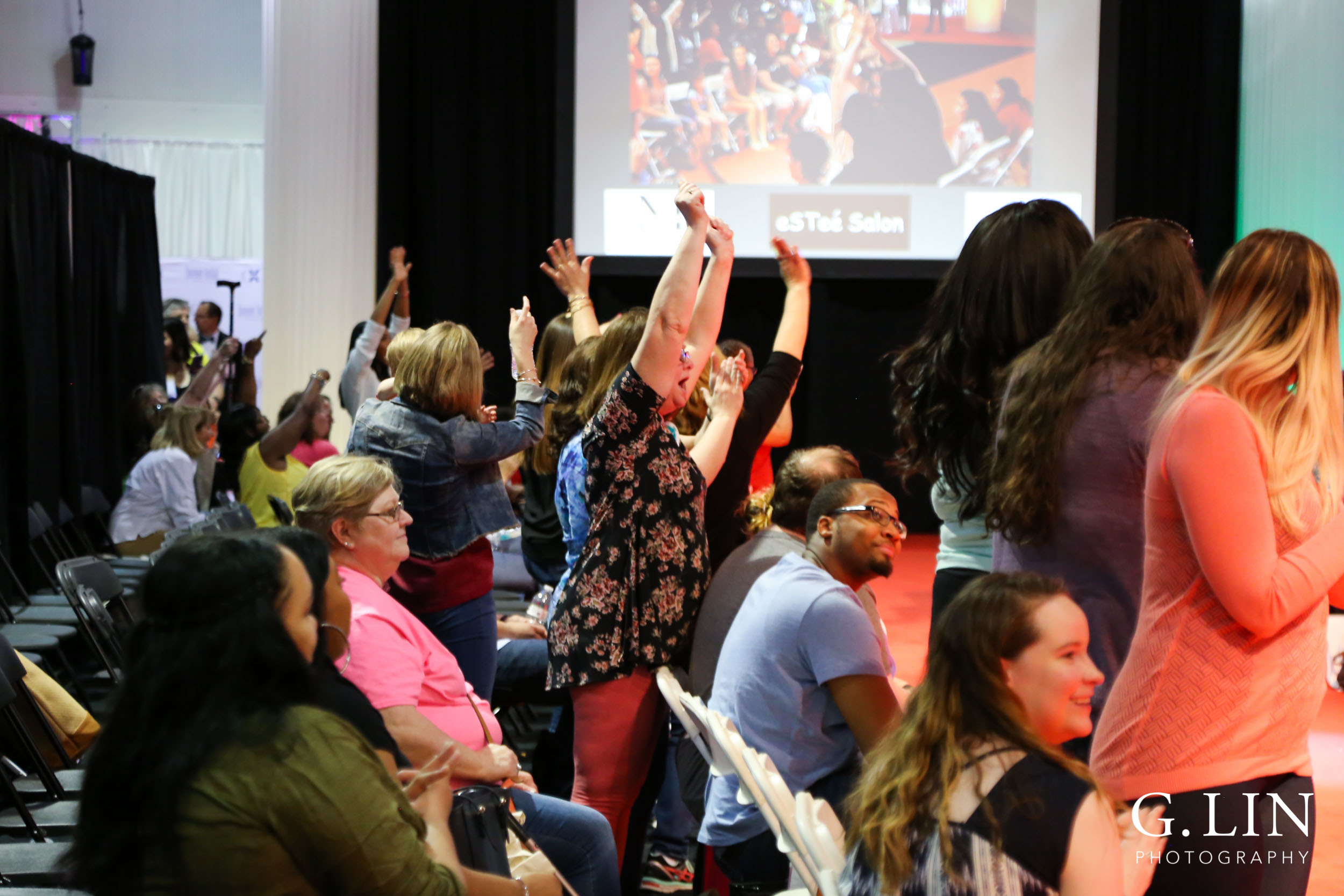 Raleigh Event Photographer | G. Lin Photography | Guests cheering during fashion show