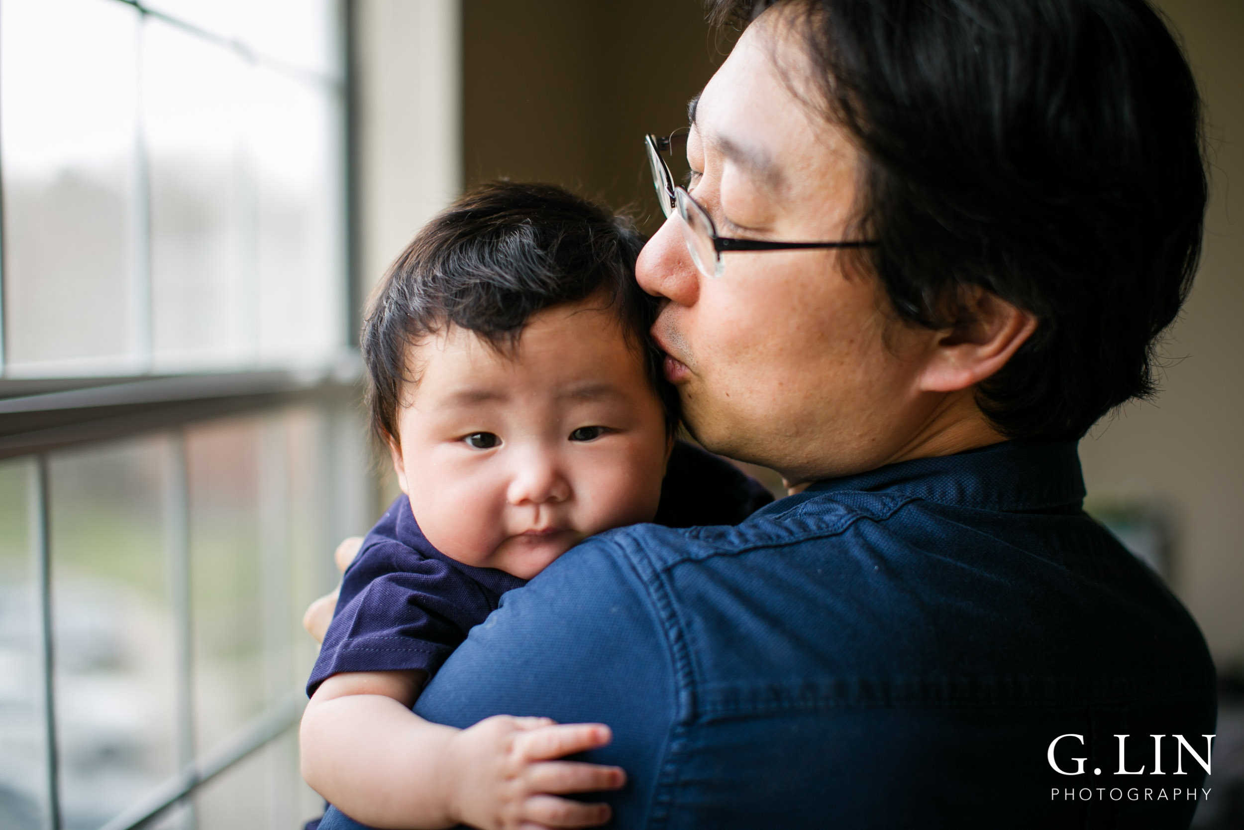 Durham Family Photographer | G. Lin Photography | Dad holding baby at home