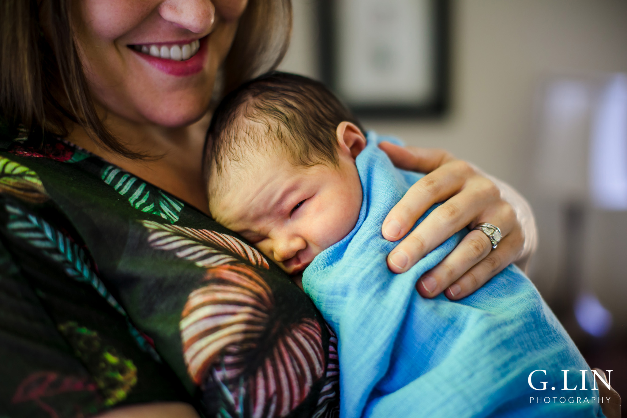 Raleigh Family Photographer | G. Lin Photography | Mother holding baby in bedroom