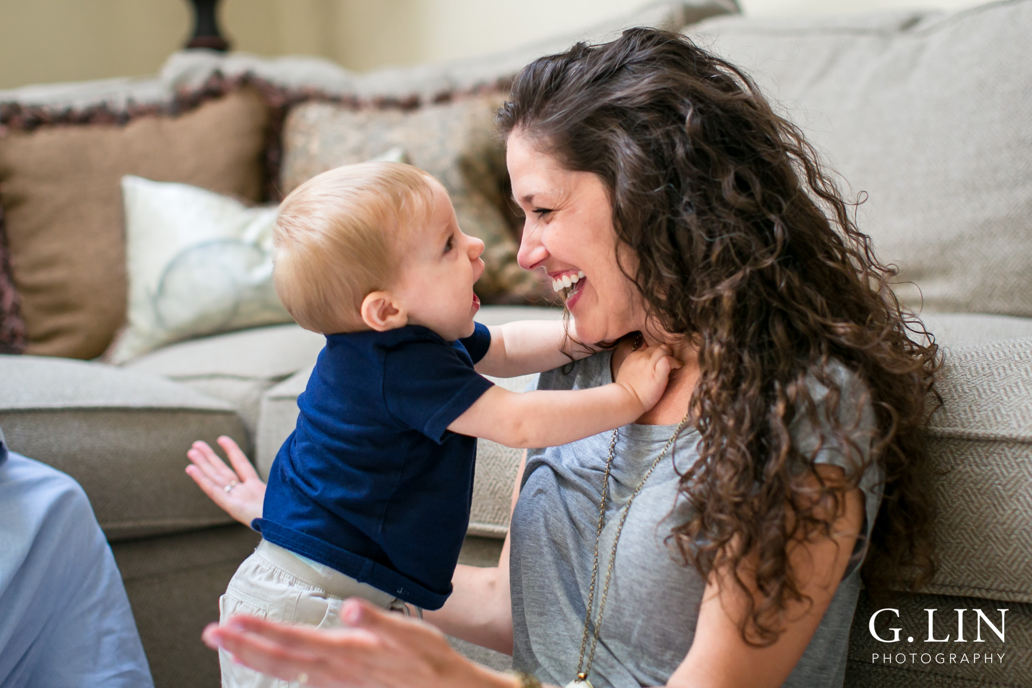 Raleigh Lifestyle Photographer | G. Lin Photographer | Baby laughing after playing with mom on the floor