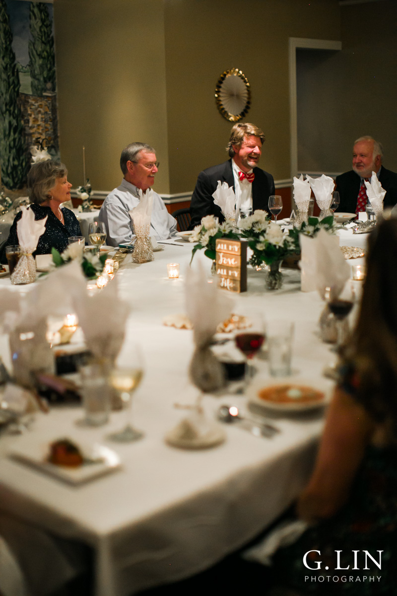 Raleigh Event Photographer | G. Lin Photography | Guests laughing around a table