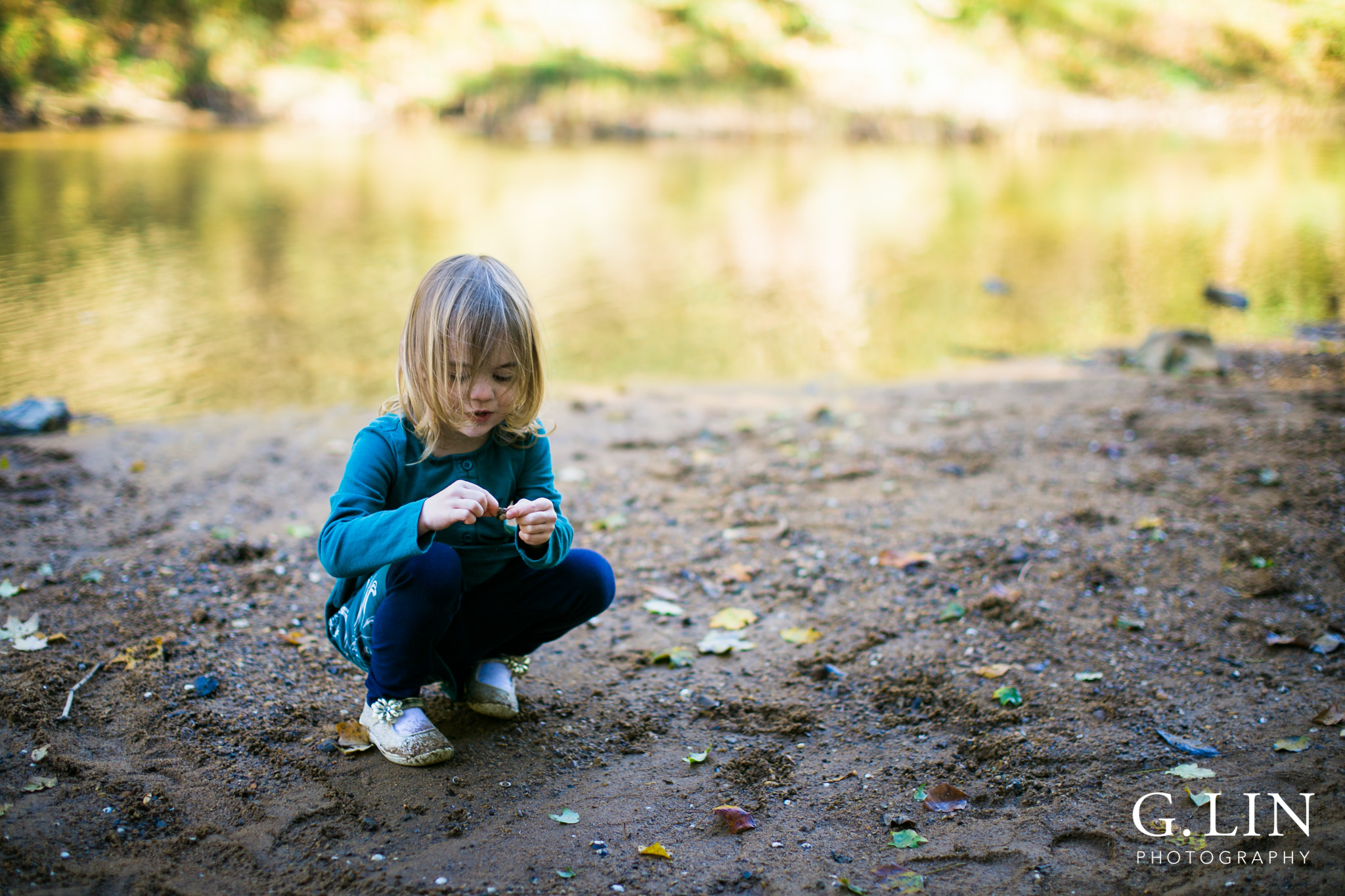 Durham Family Photographer | G. Lin Photography | Girl playing in sand by river
