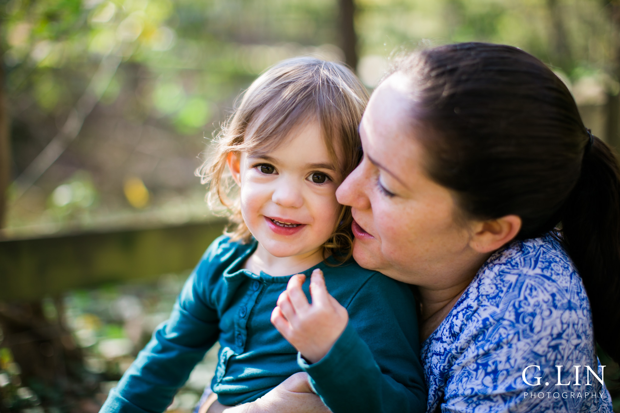 Durham Family Photographer | G. Lin Photography | Mother and daughter hugging and smiling
