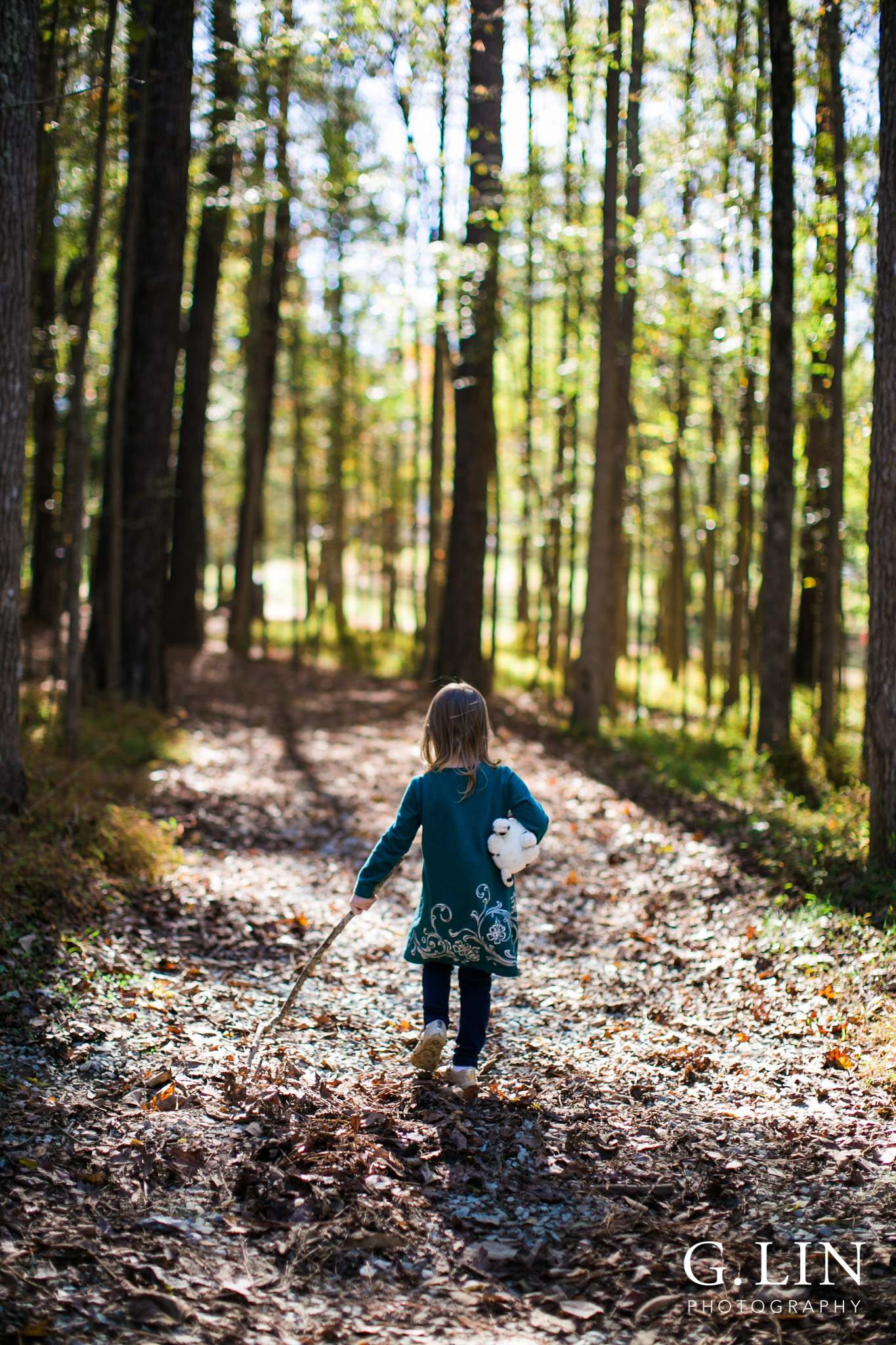 Durham Family Photographer | G. Lin Photography | Little girl walking in woods