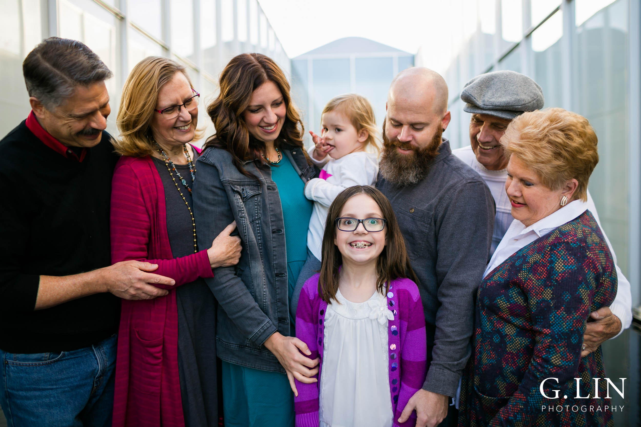 Raleigh Family Photographer | G. Lin Photography | Girl making a funny face in family photo