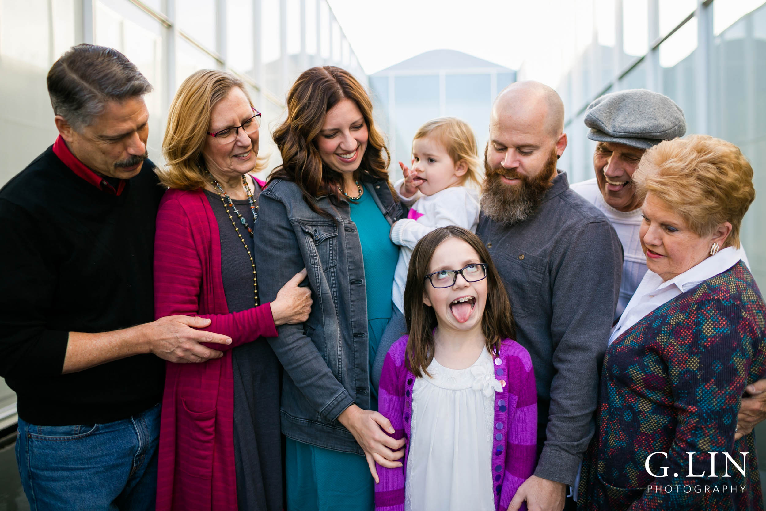 Raleigh Family Photographer | G. Lin Photography |  Girl making a silly face for family session