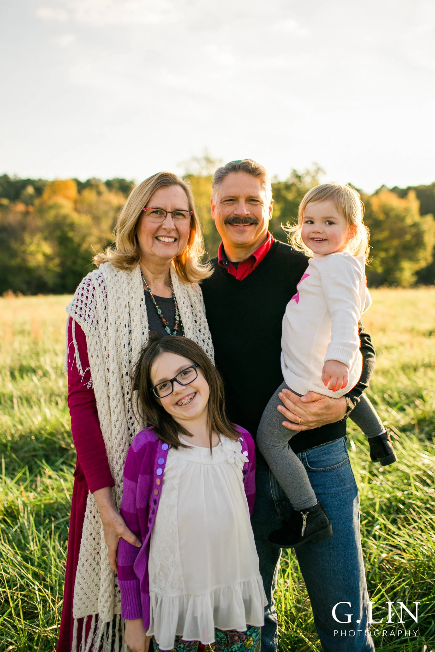 Candid lifestyle photo of grandparents with grandkids | Raleigh Family Photographer | G. Lin Photography