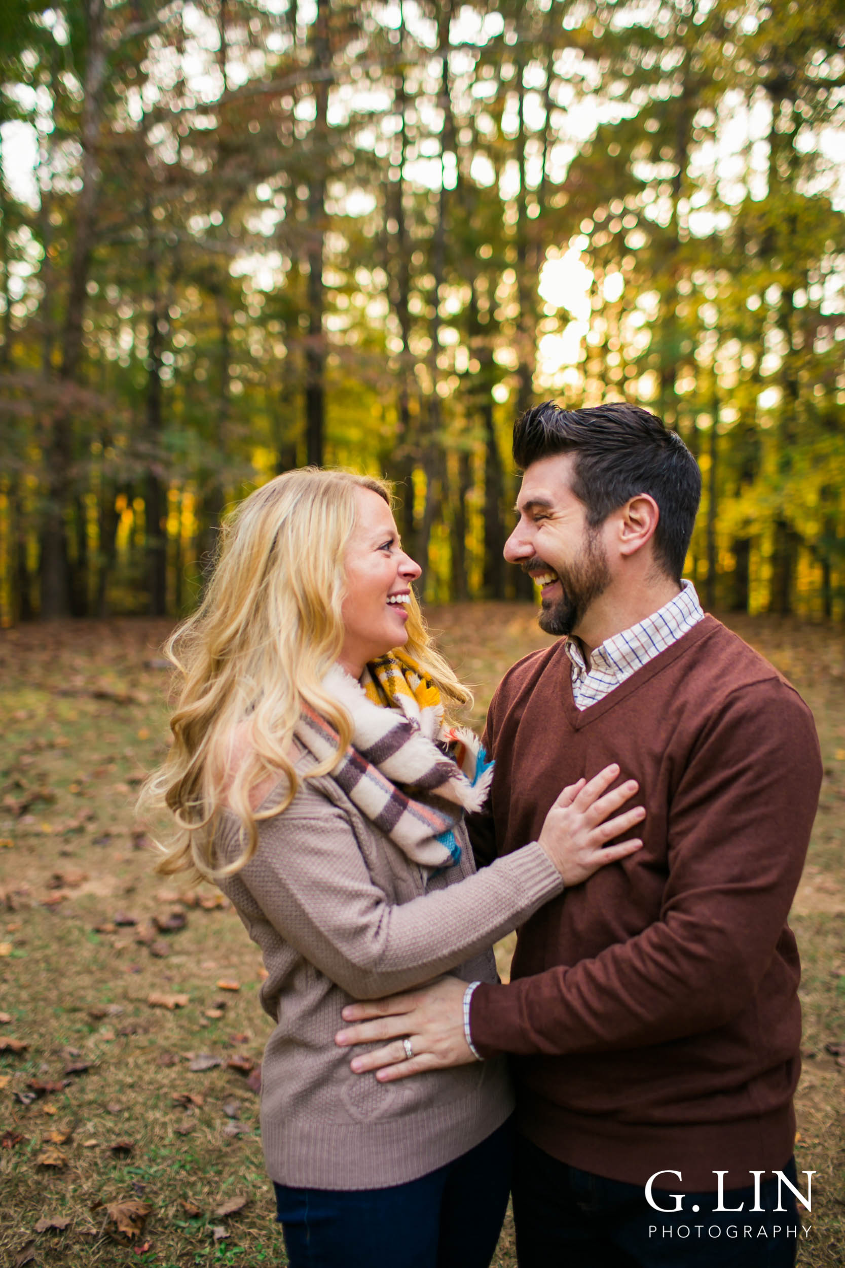 Raleigh Family Photographer | G. Lin Photography | Couple laughing together at Umstead park
