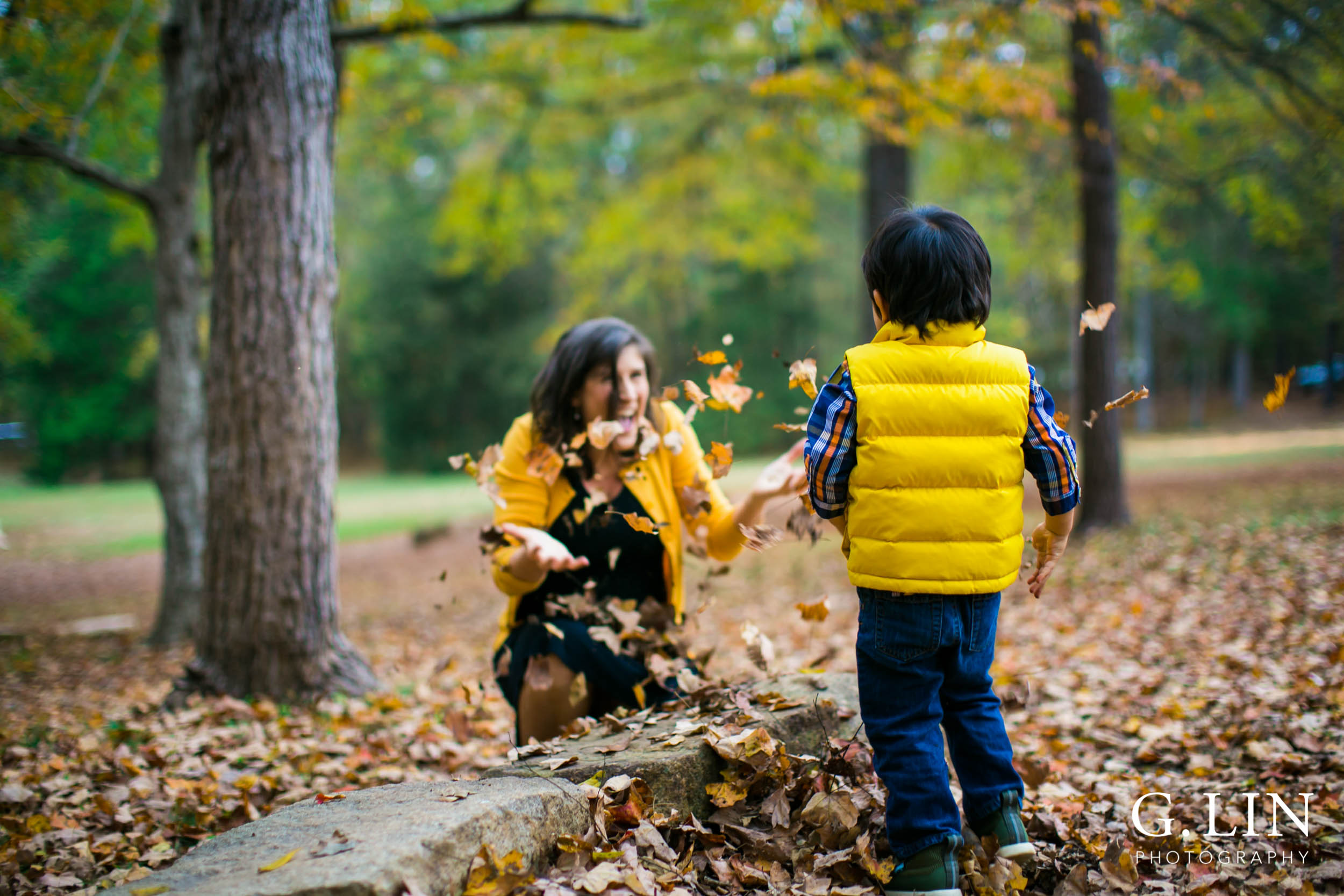 Durham Family Photography | G. Lin Photography | Playing with the leaves in the park