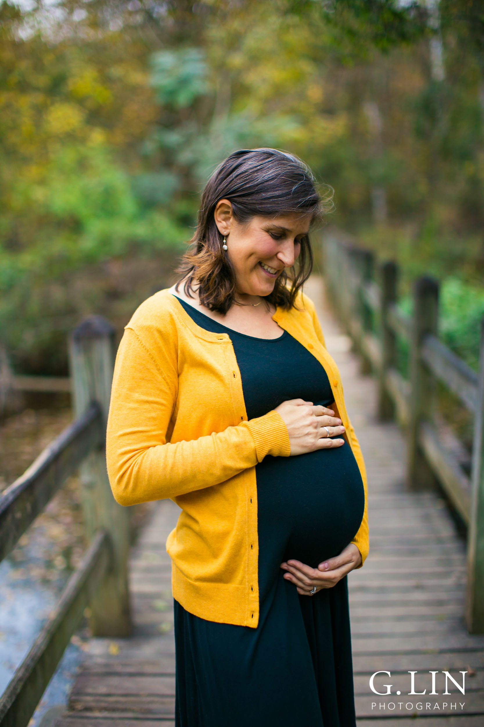 Durham Family Photography | G. Lin Photography | Mother looking at belly 