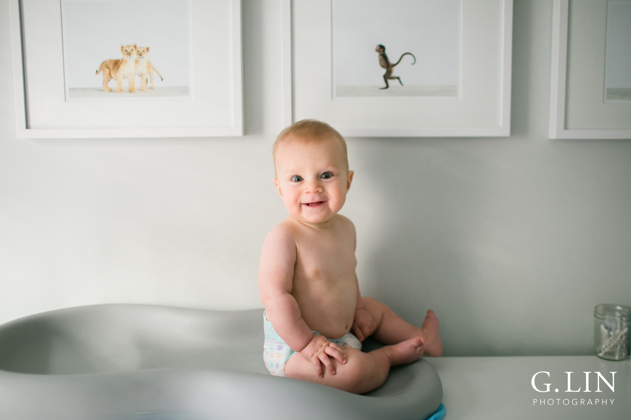 Durham Family Photographer | G. Lin Photography | Cute baby sitting on table with white background