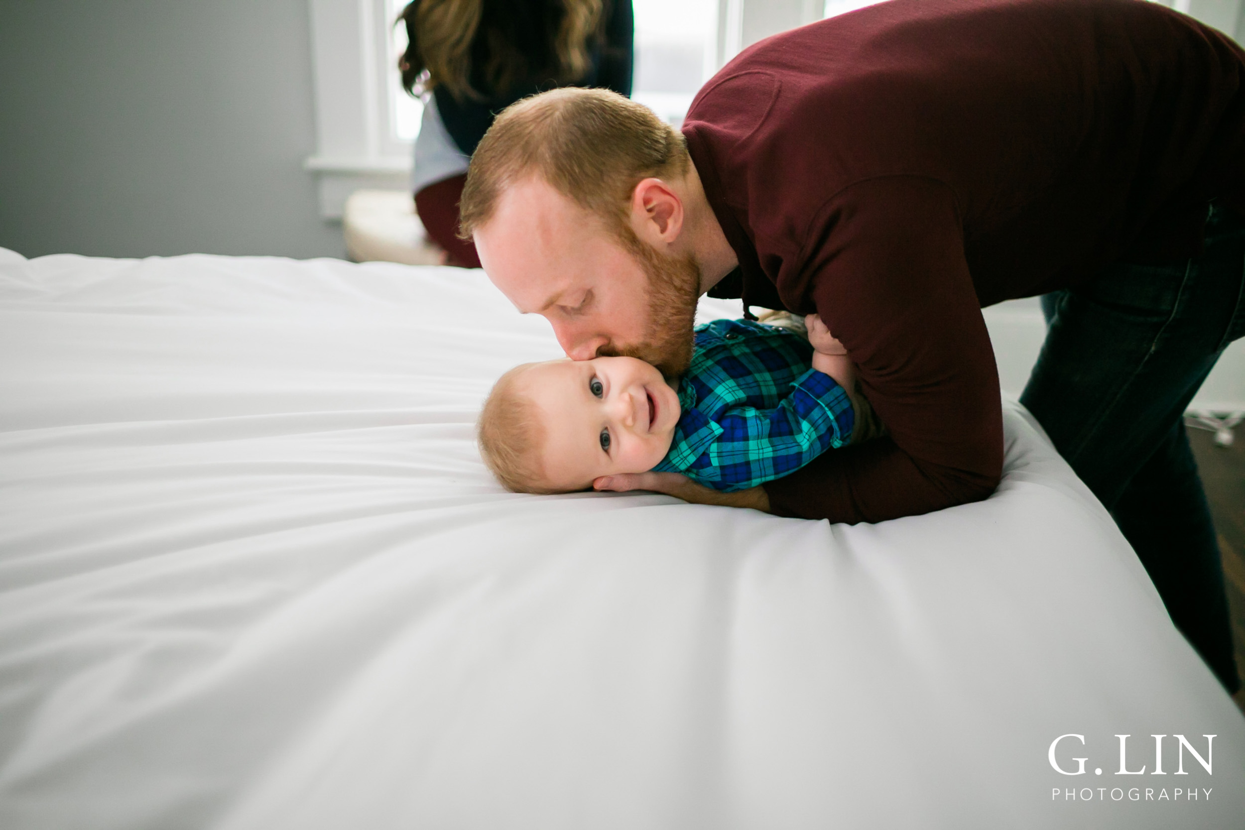 Durham Family Photographer | G. Lin Photography | dad kissing baby son on cheek