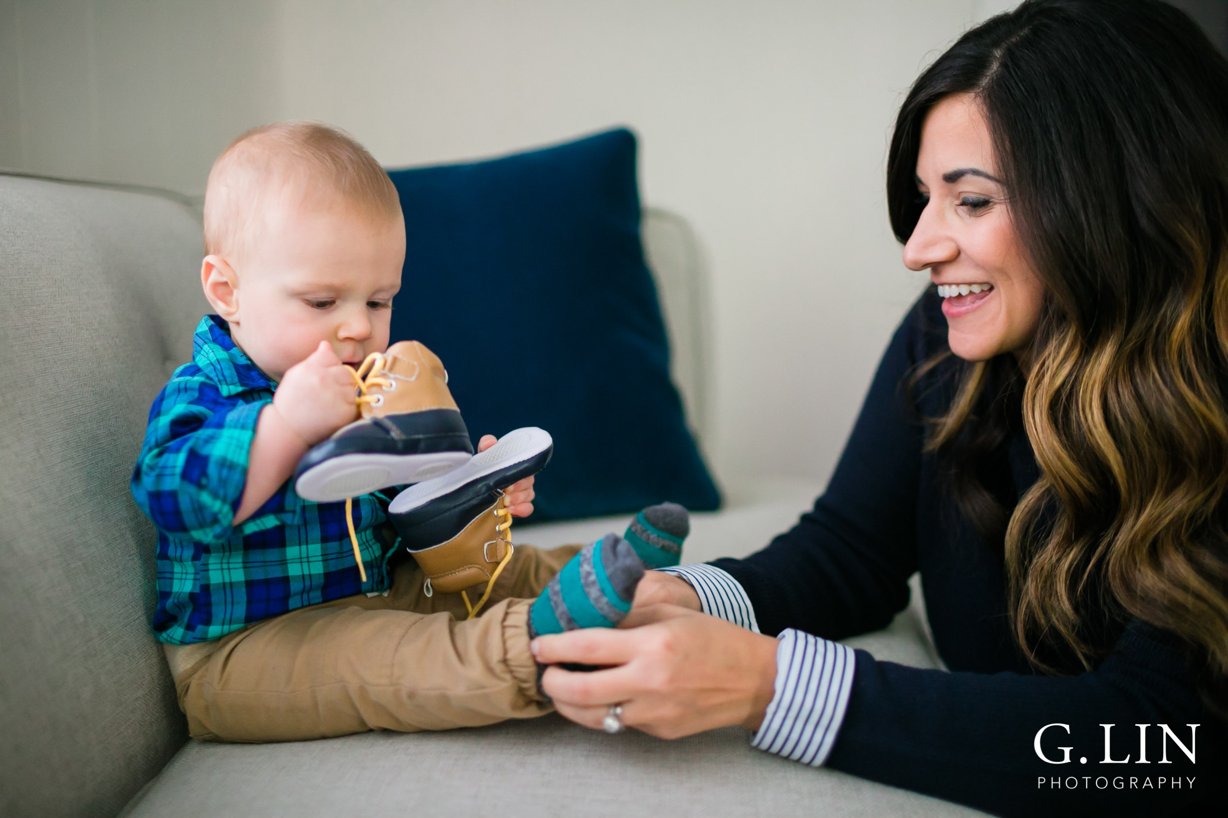 Durham Family Photographer | G. Lin Photography | mom putting shoes on baby boy