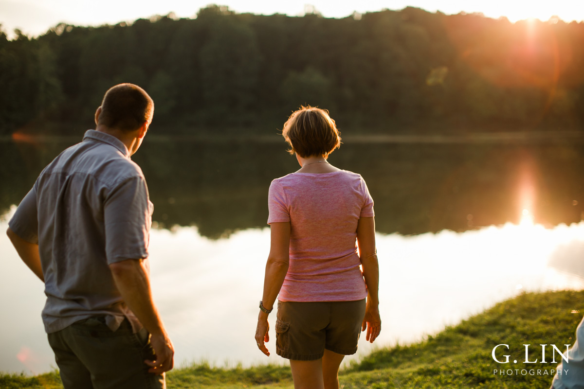 Raleigh Family Photographer | By G. Lin Photography | Candid photo of parents by the lake