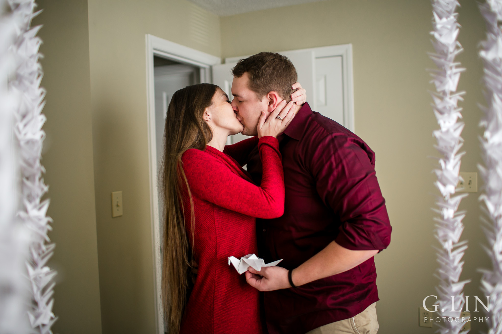 Kissing couple during proposal | Raleigh Engagement Photographer | By G. Lin Photography
