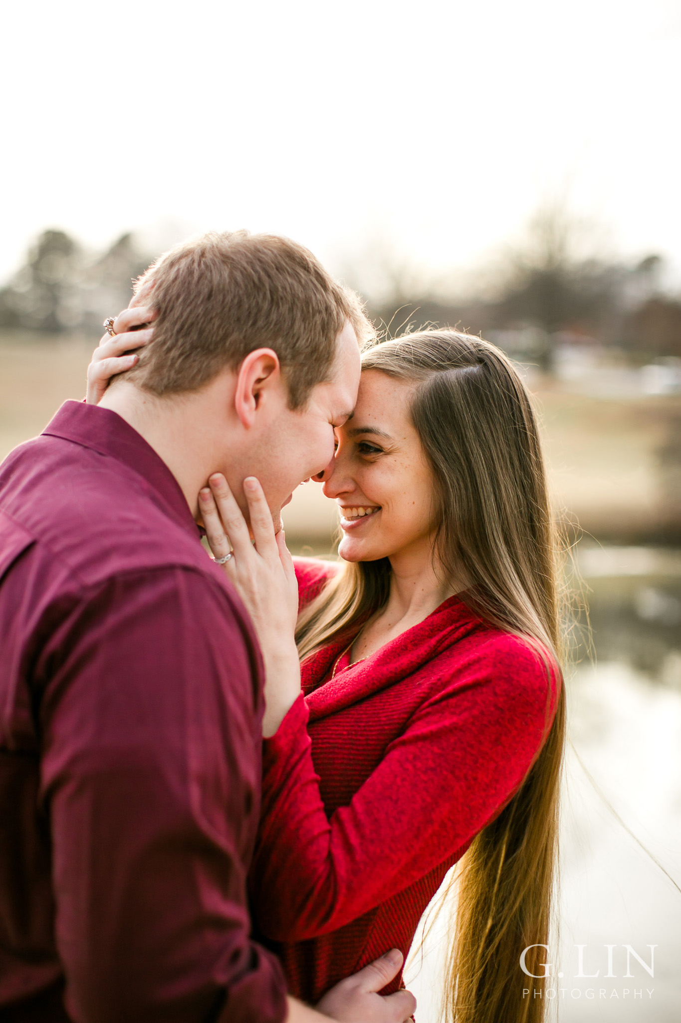Couple looking at each other outside | Raleigh Engagement Photographer | By G. Lin Photography
