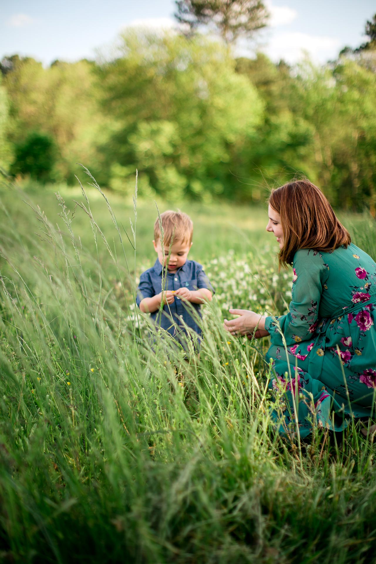 Raleigh Family Photographer | G. Lin Photography | Mother and son playing in the field at NC Museum of Art