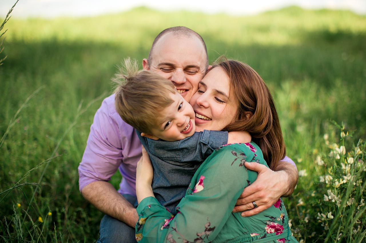 Durham Family Photographer | G. Lin Photography | Family of three smiling and hugging