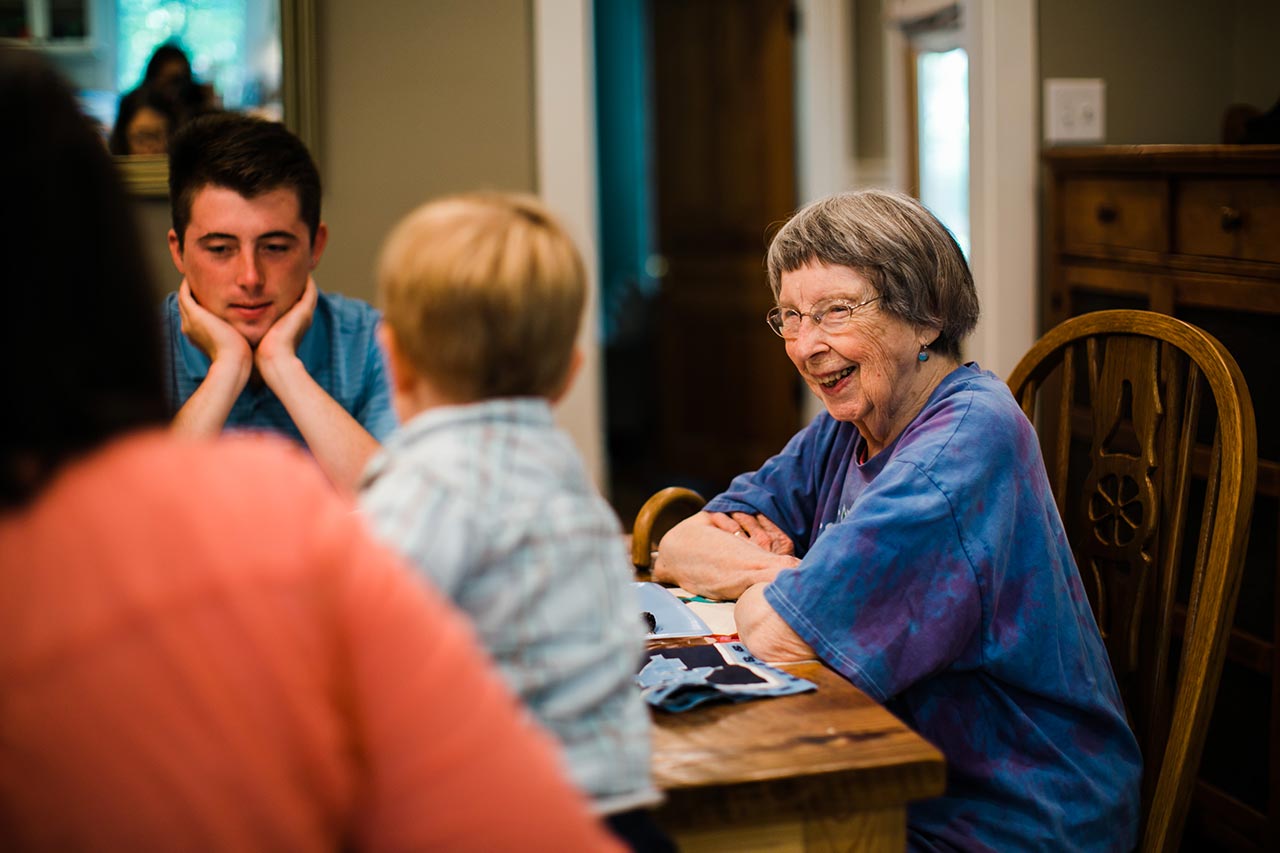 Candid photo of grandma | Graduation Portraits for UNC Student | By G. Lin Photography | Durham Graduation Photographer