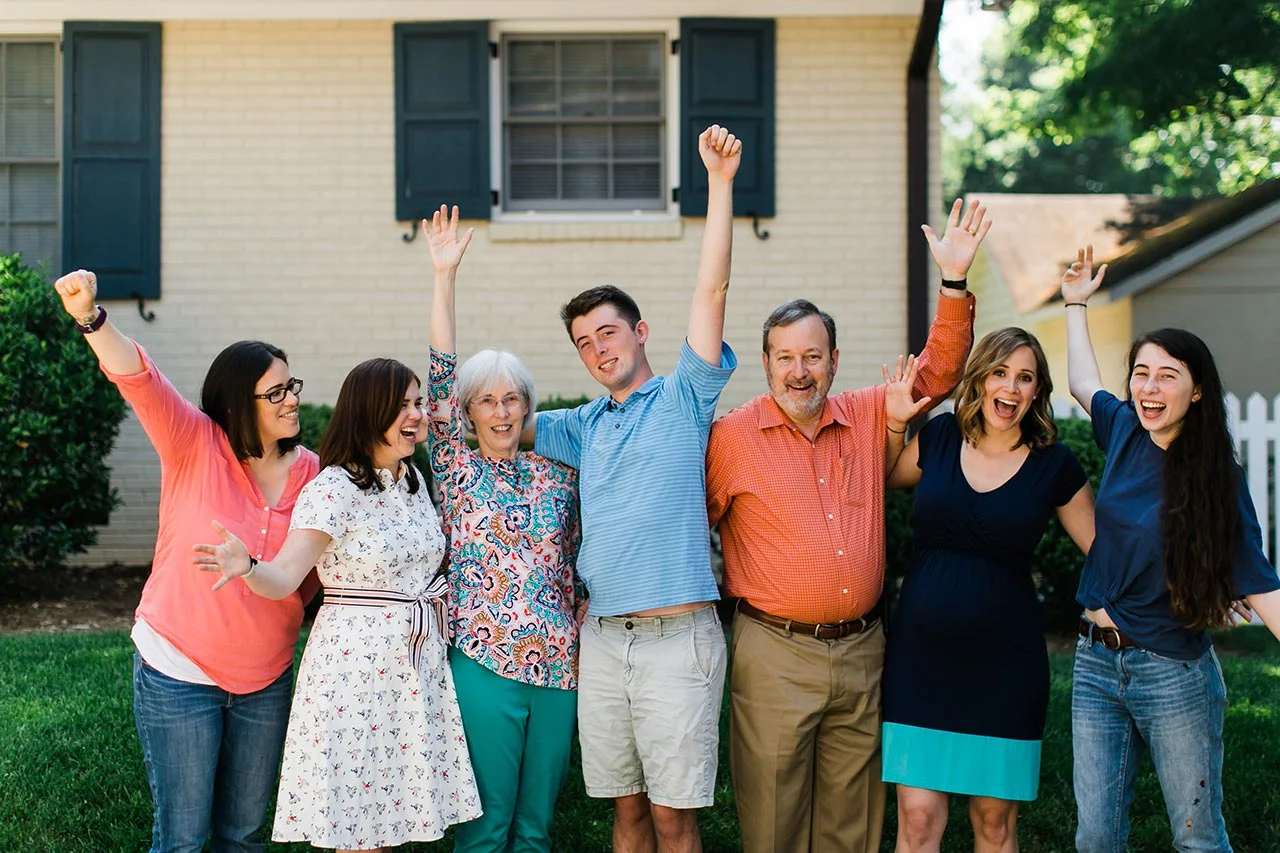 Family Cheering | Graduation Portraits for UNC Student | By G. Lin Photography | Raleigh Photographer