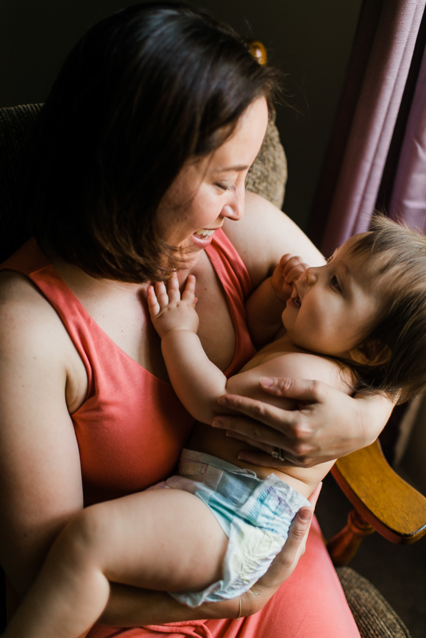 Mother looking at daughter in nursery | Durham Newborn Photography | By G. Lin Photography