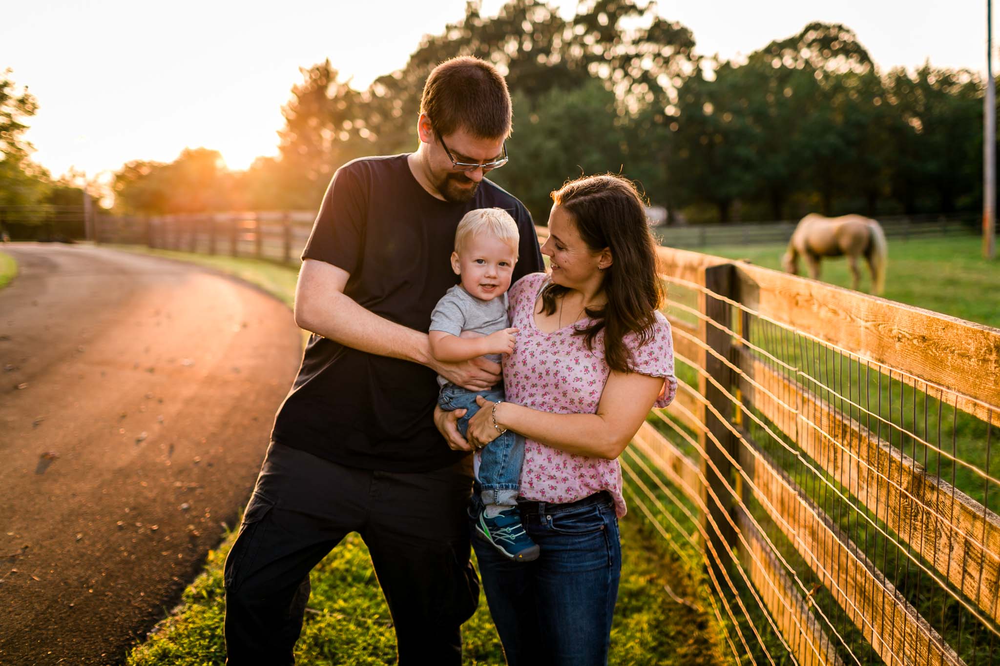 Parents tickling son | By G. Lin Photography | Durham Family Photographer