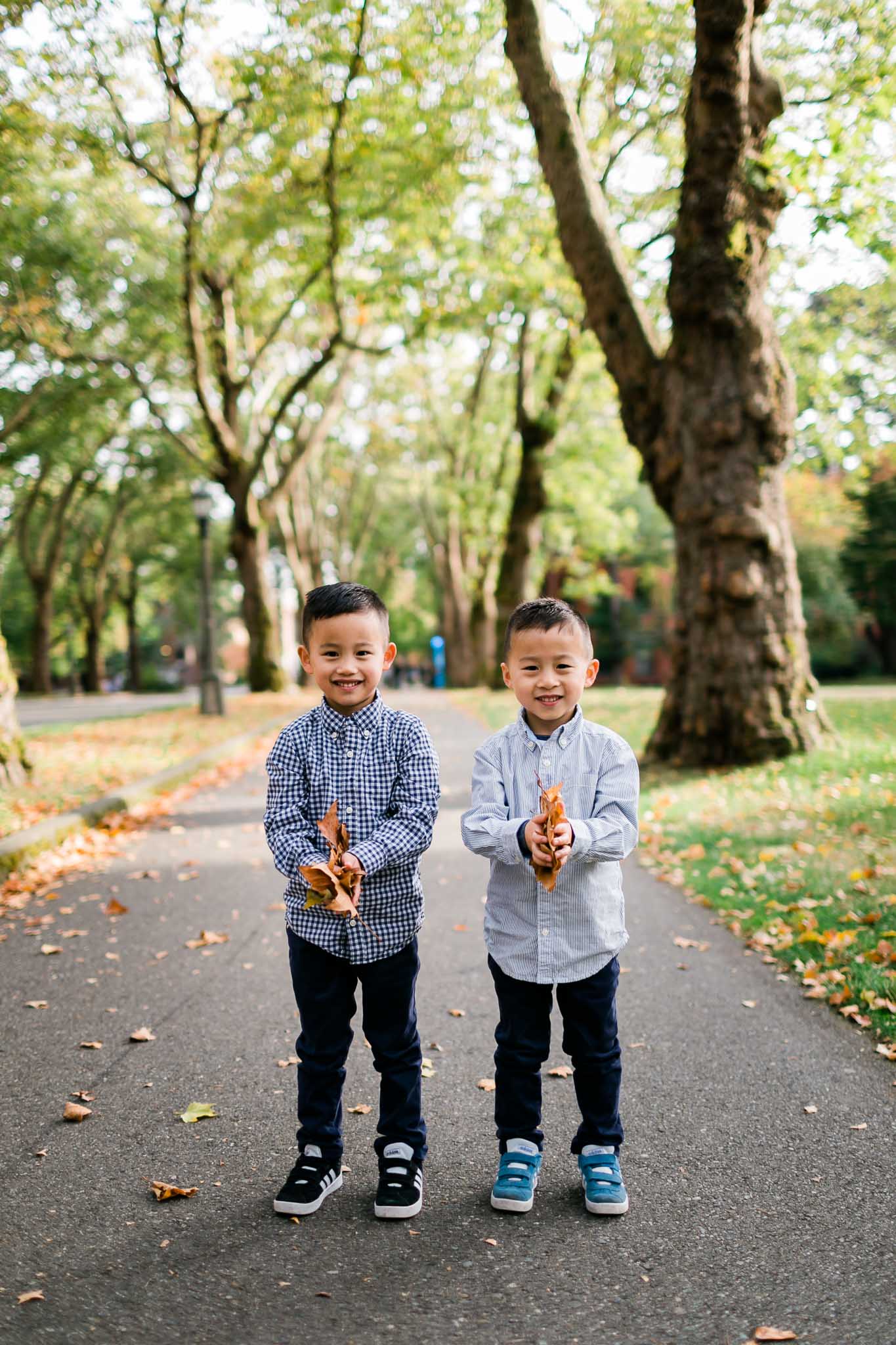 Boys holding leaves | Durham Family Photographer | By G. Lin Photography