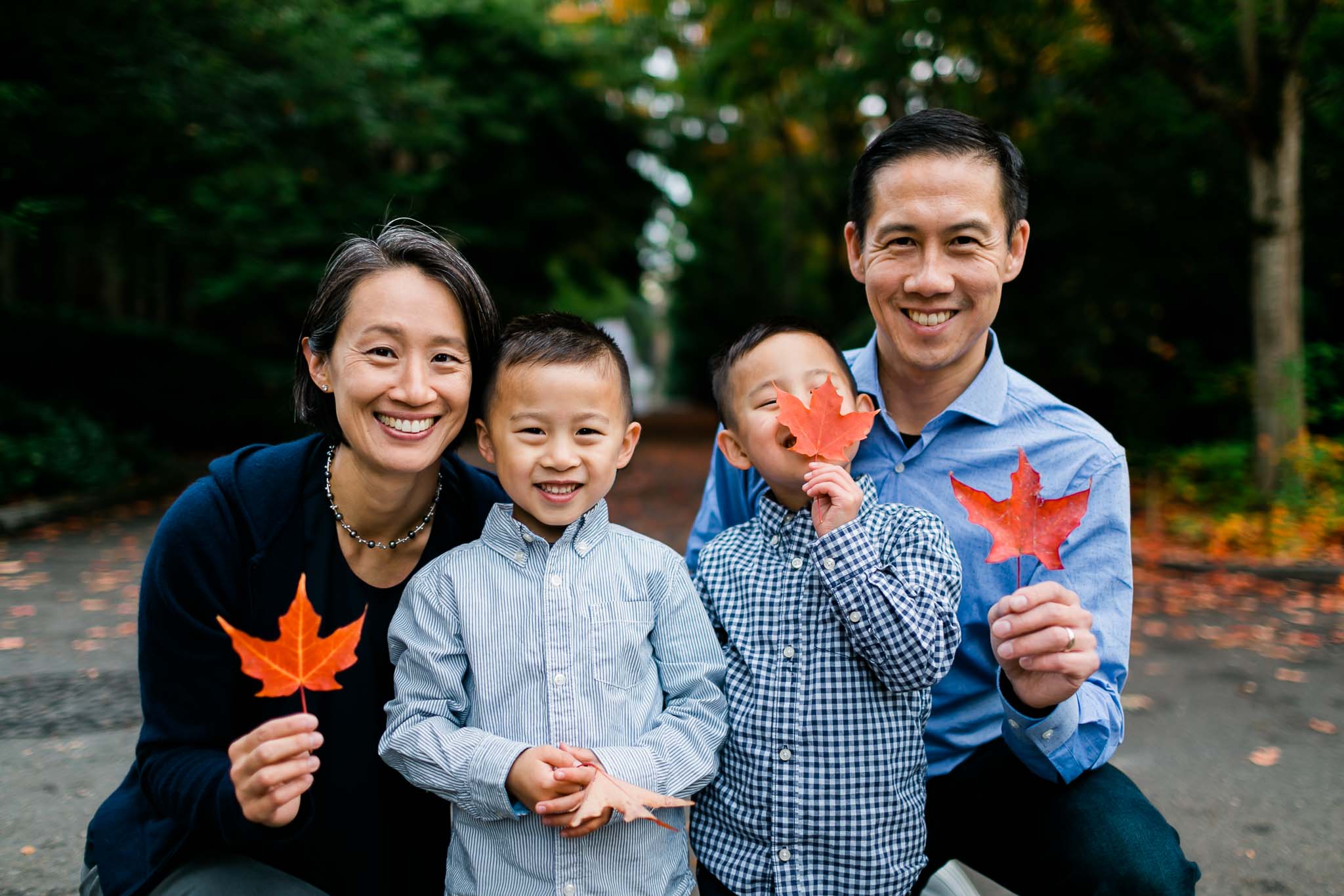 Family holding leaves | Seattle Family Photographer | By G. Lin Photography