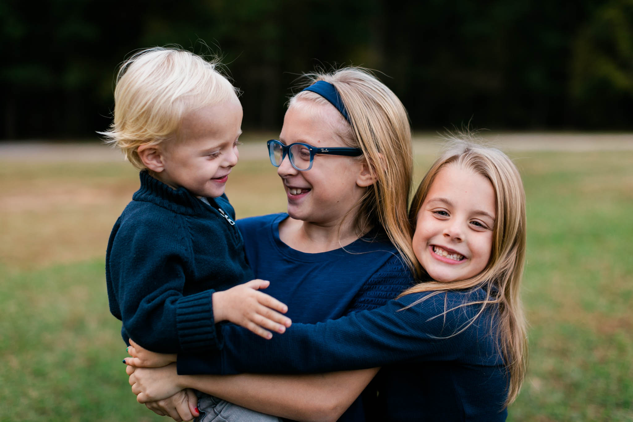 Sibling photo of three children at Umstead Park | Raleigh Family Photography | By G. Lin Photography