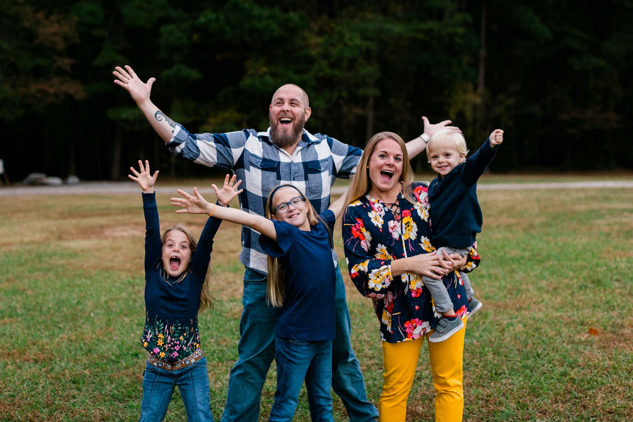 Candid photo of family laughing at Umstead Park | Raleigh Family Photographer | By G. Lin Photography