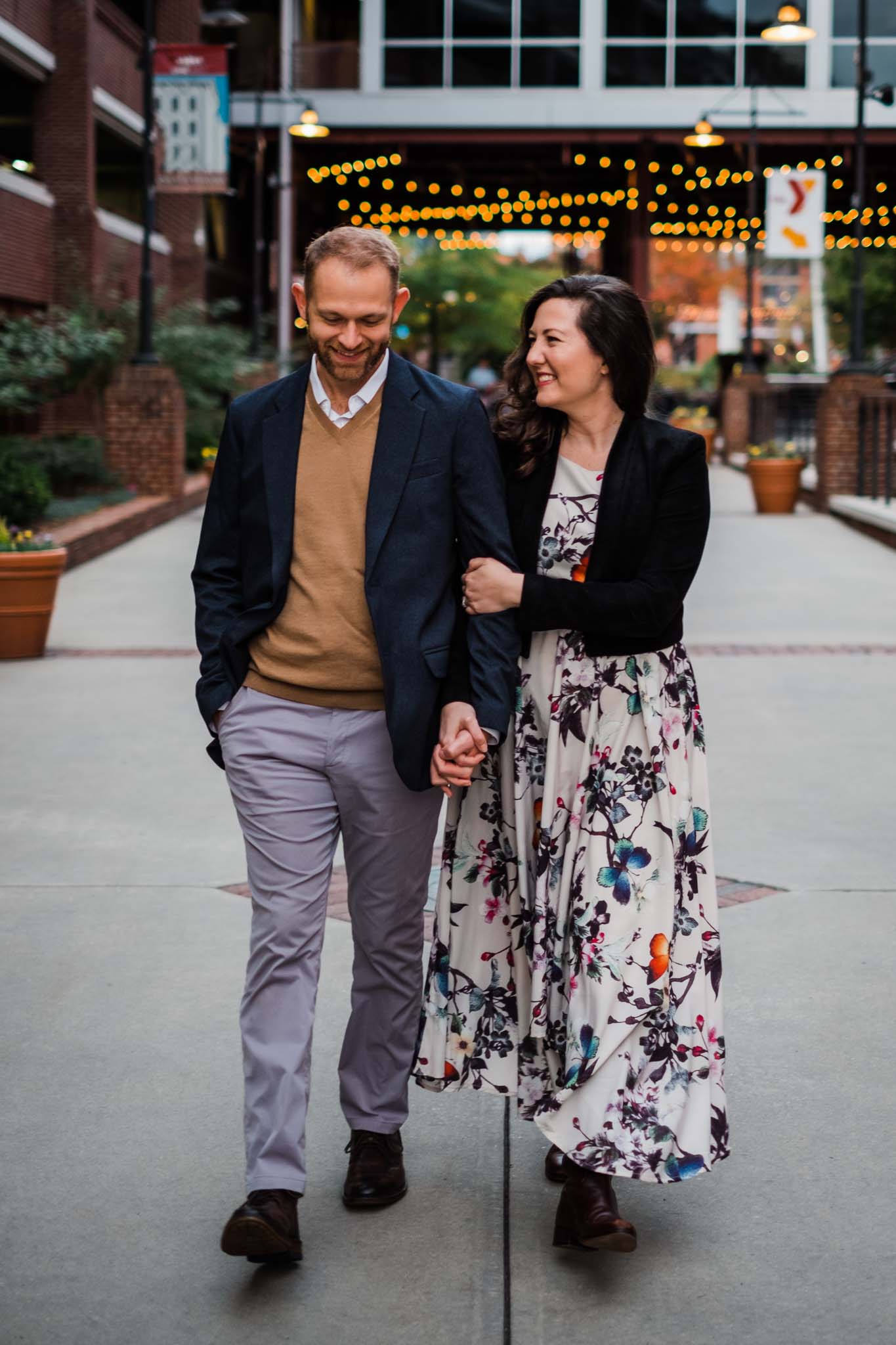 Couple laughing outside of American Tobacco Campus | Durham Photographer | By G. Lin Photography