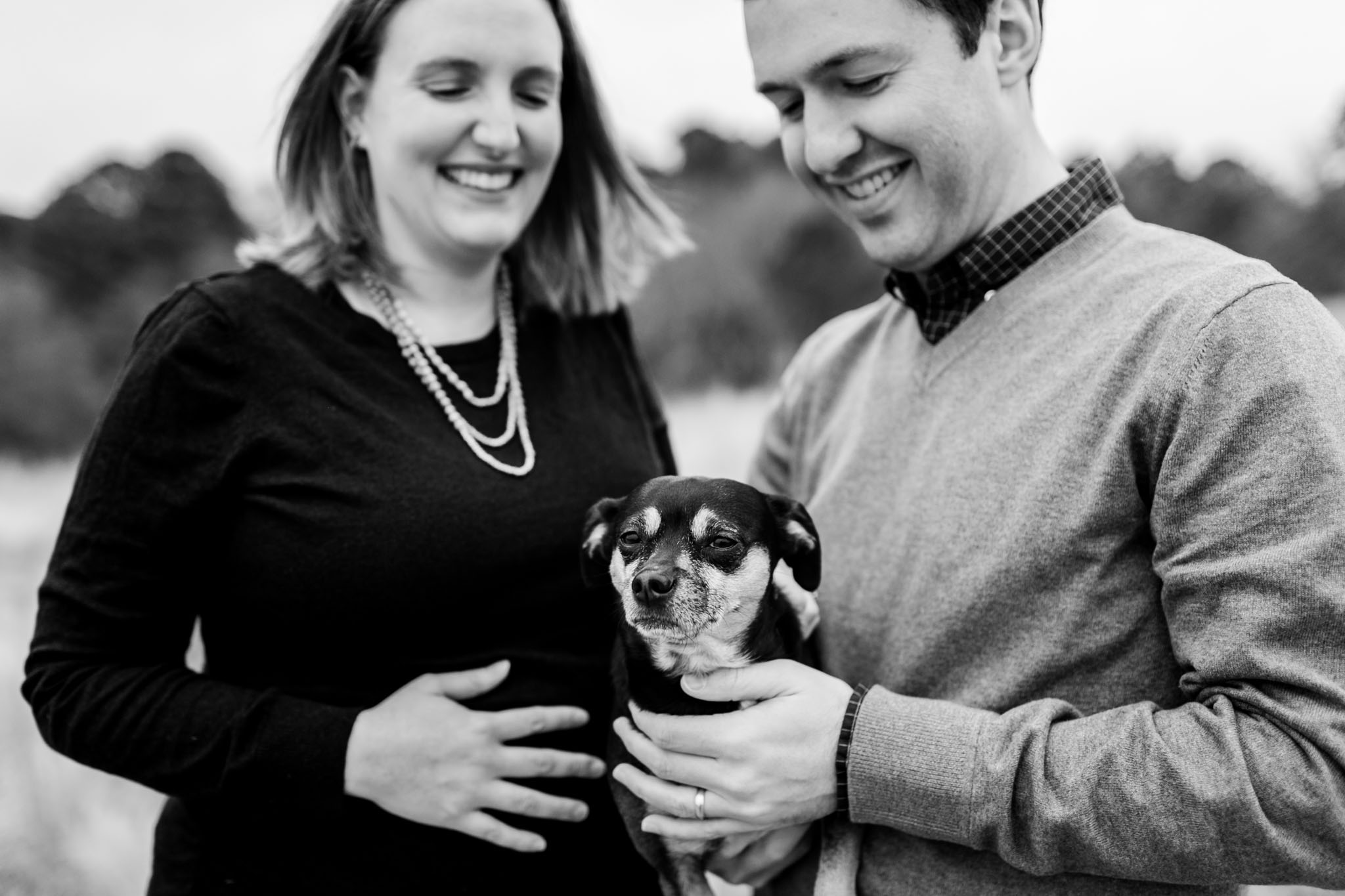 Modern black and white photo of family with dog | Raleigh Maternity Photographer | By G. Lin Photography