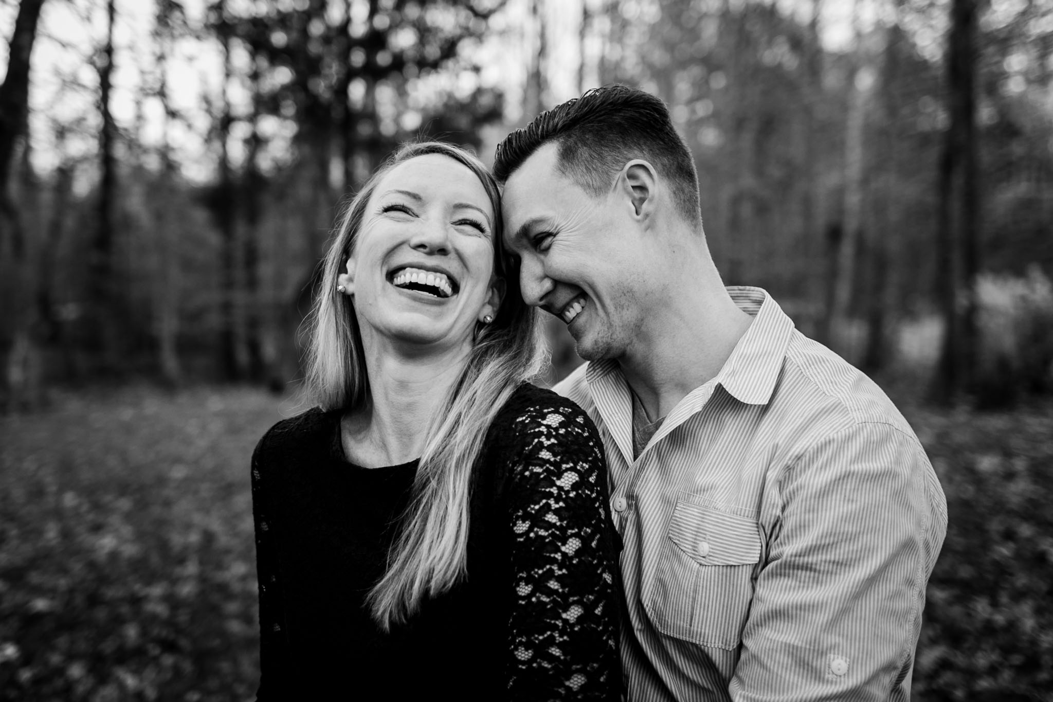 Candid black and white photo of couple | By G. Lin Photography | Durham Photographer