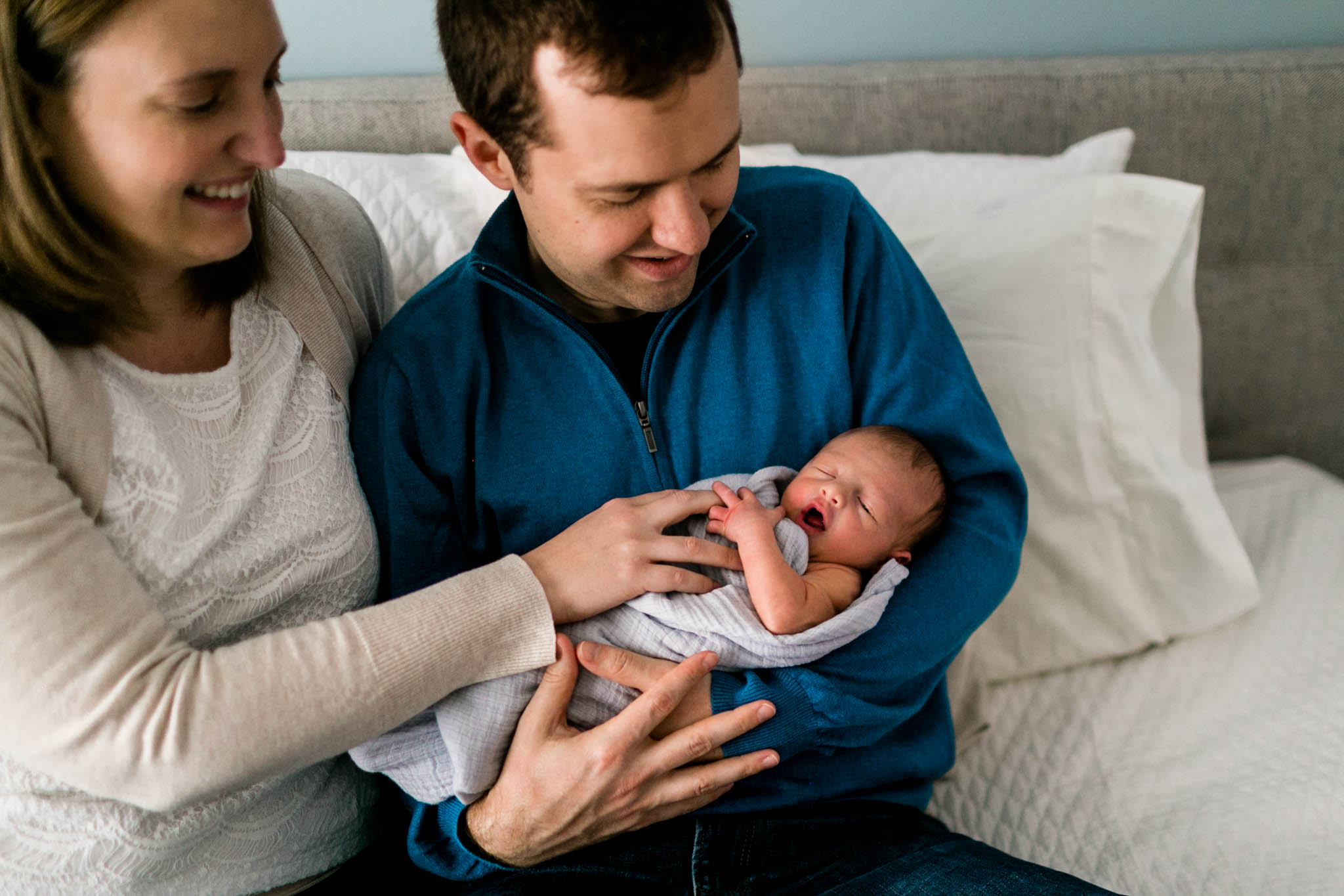 Baby holding parent's finger while sleeping | Newborn Photography in Durham NC | By G. Lin Photography