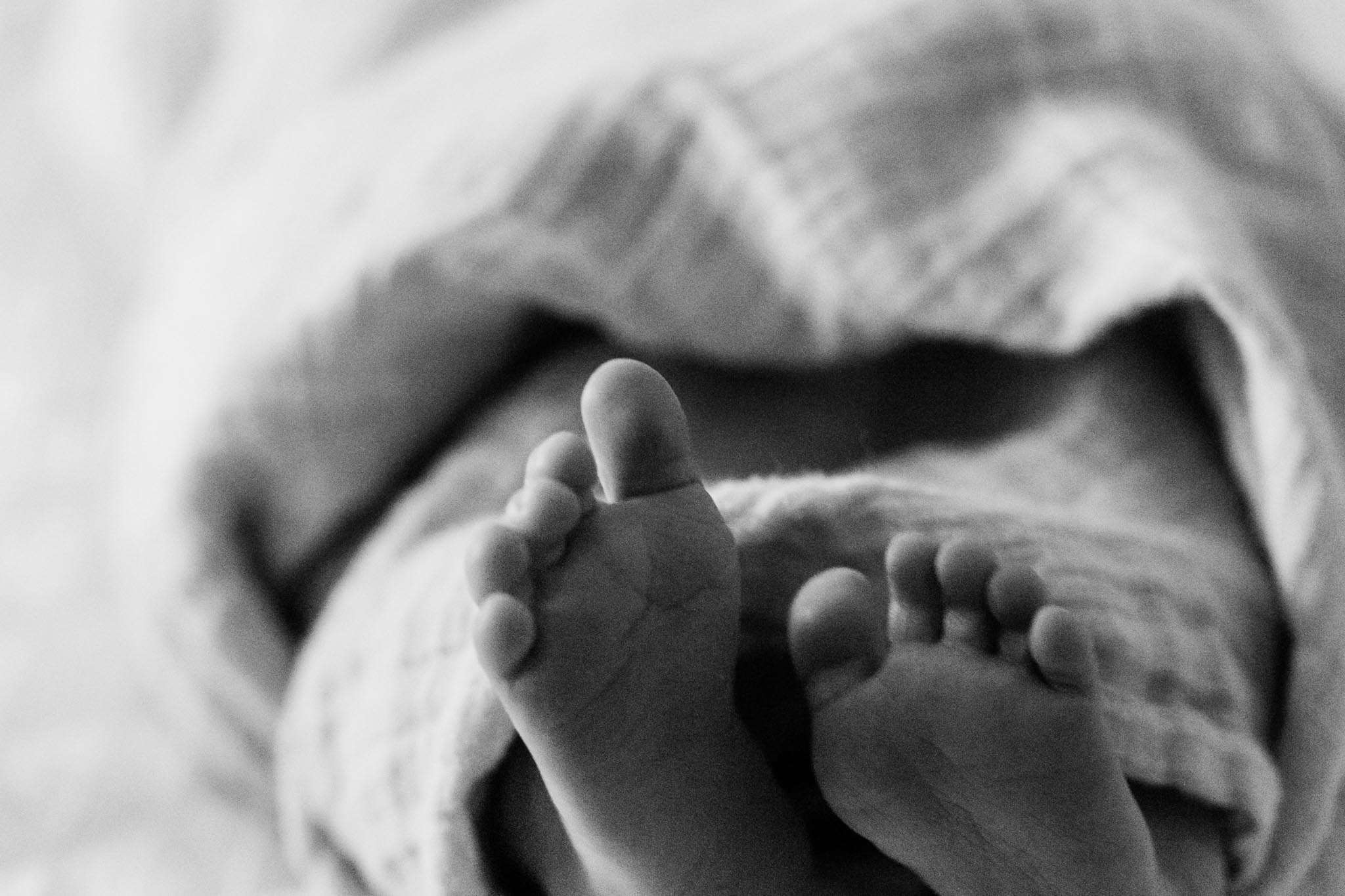 Raleigh Newborn Photographer | By G. Lin Photography | Black and white photo of baby's feet