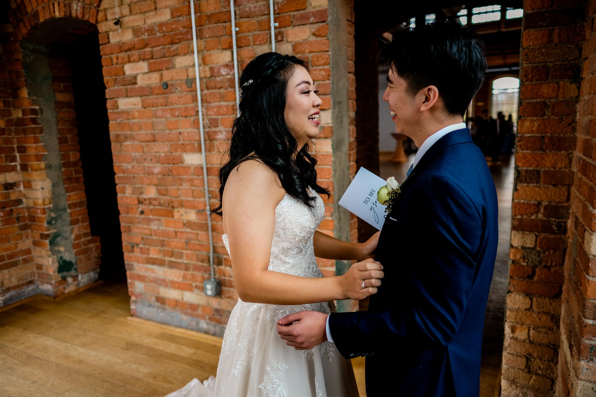 Bride laughing with groom | The Cotton Room Wedding Photography | Durham NC | By G. Lin Photography