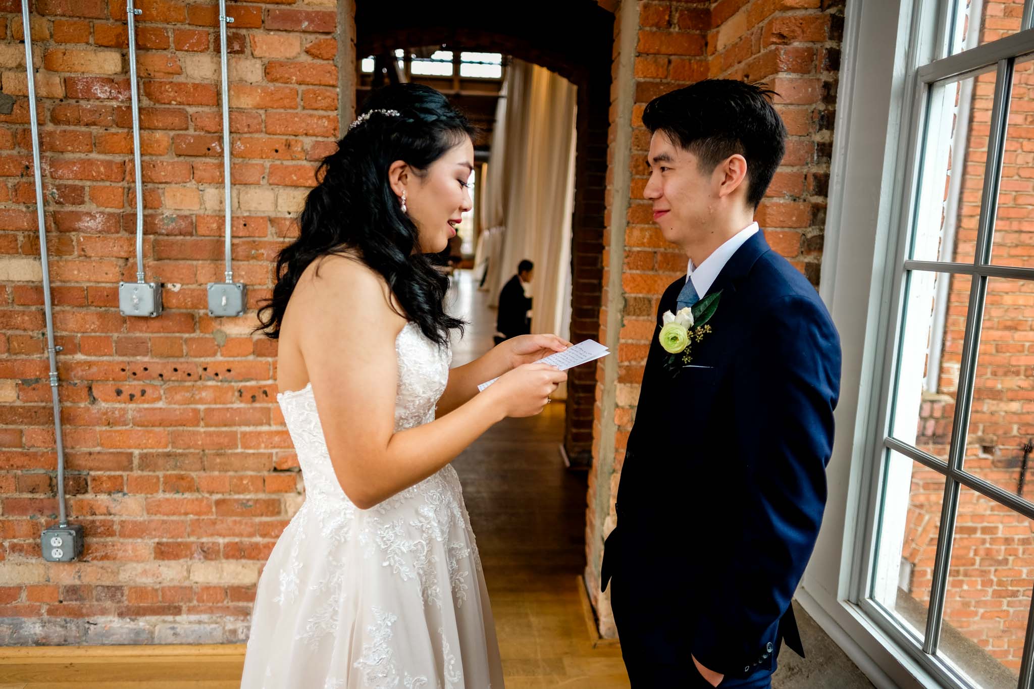 Bride reading letter to groom | The Cotton Room Wedding Photography | By G. Lin Photography | Durham NC