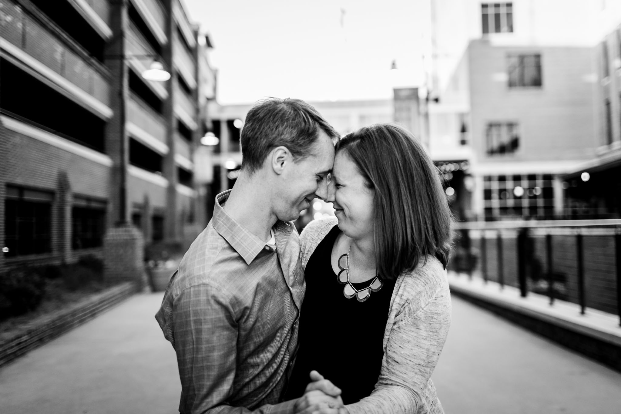 Durham Photographer | Couple dancing together at American Tobacco Campus | By G. Lin Photography