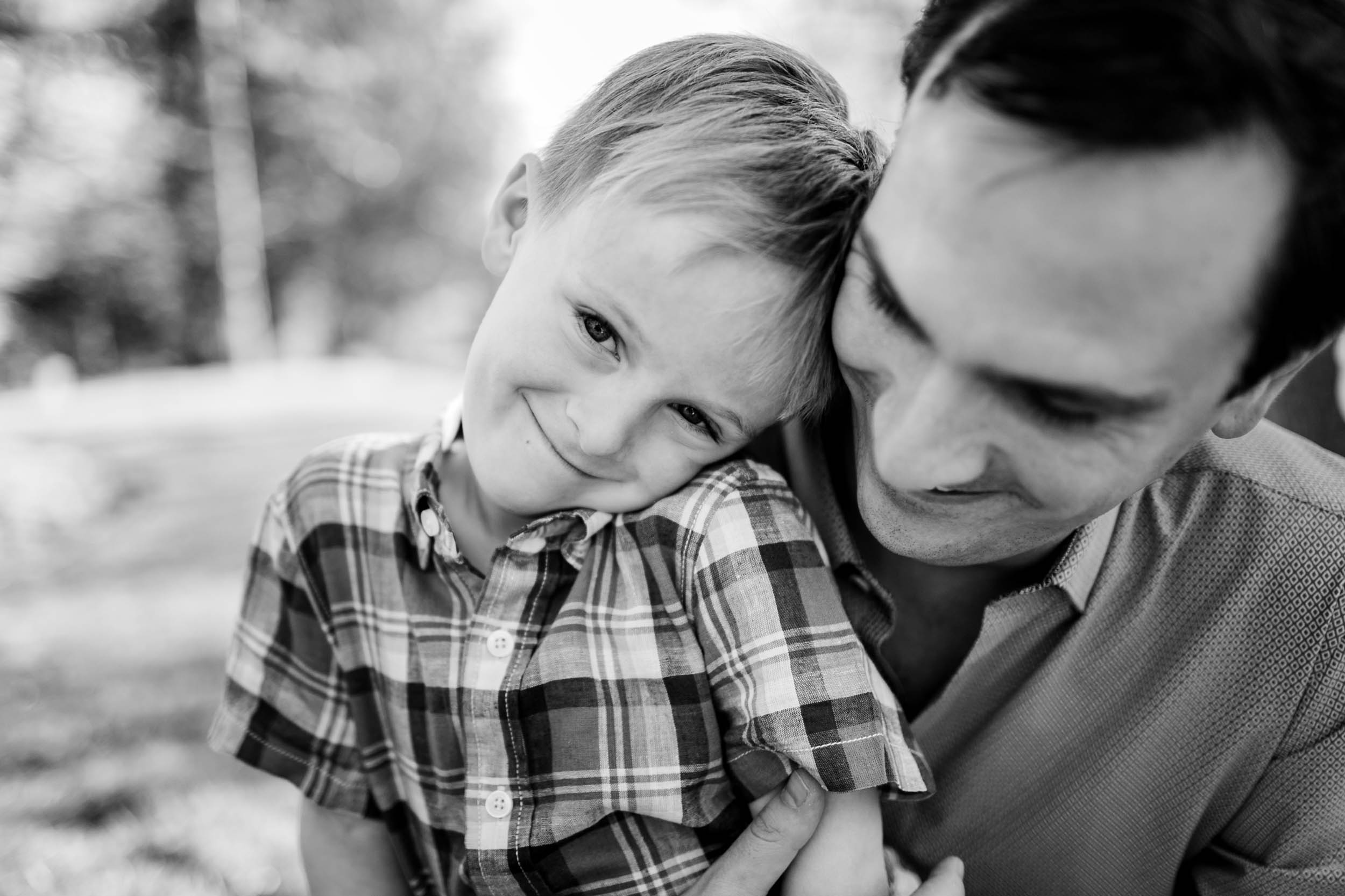 Black and white photo of father and son | Raleigh Family Photographer | By G. Lin Photography