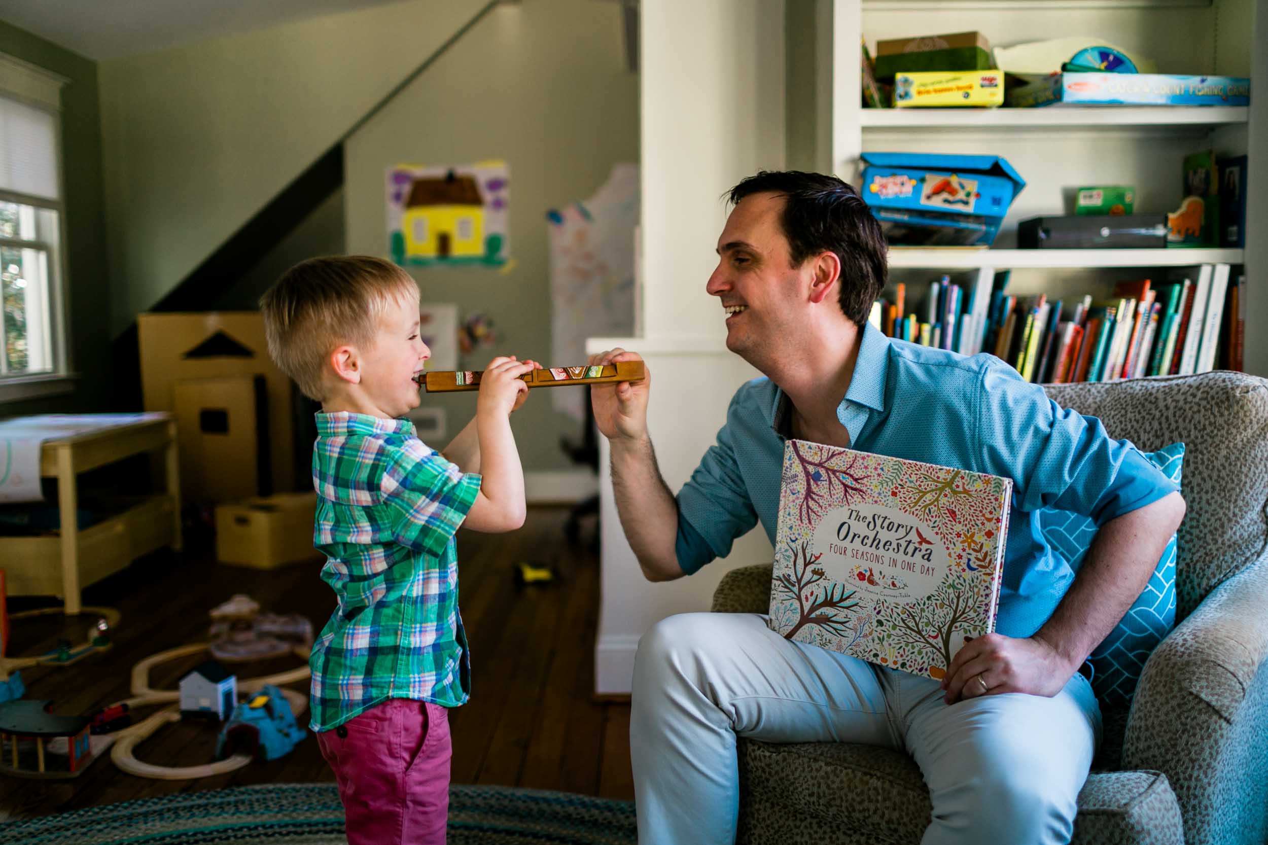 Father and son laughing | Durham Family Photographer | By G. Lin Photography