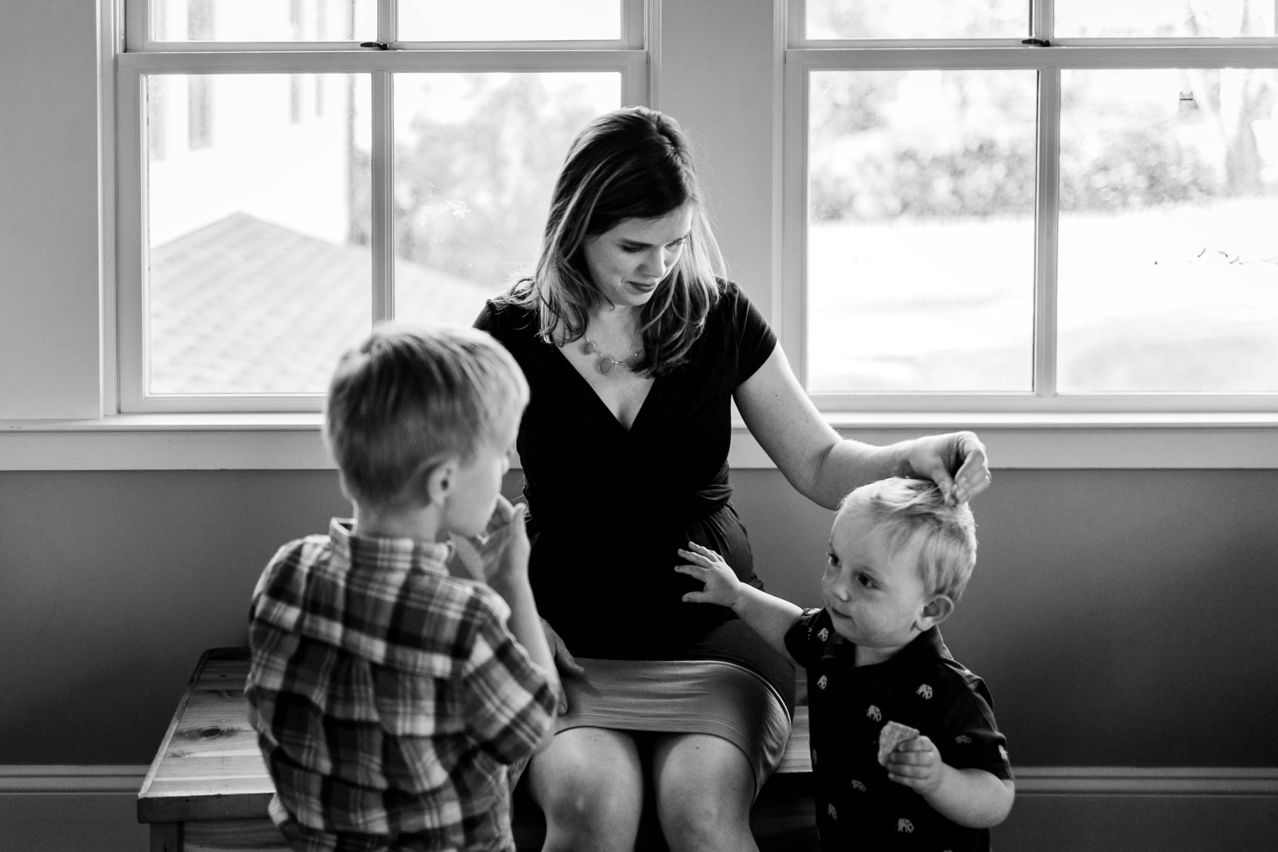 Mother fixing son's hair | Durham Family Photographer | By G. Lin Photography