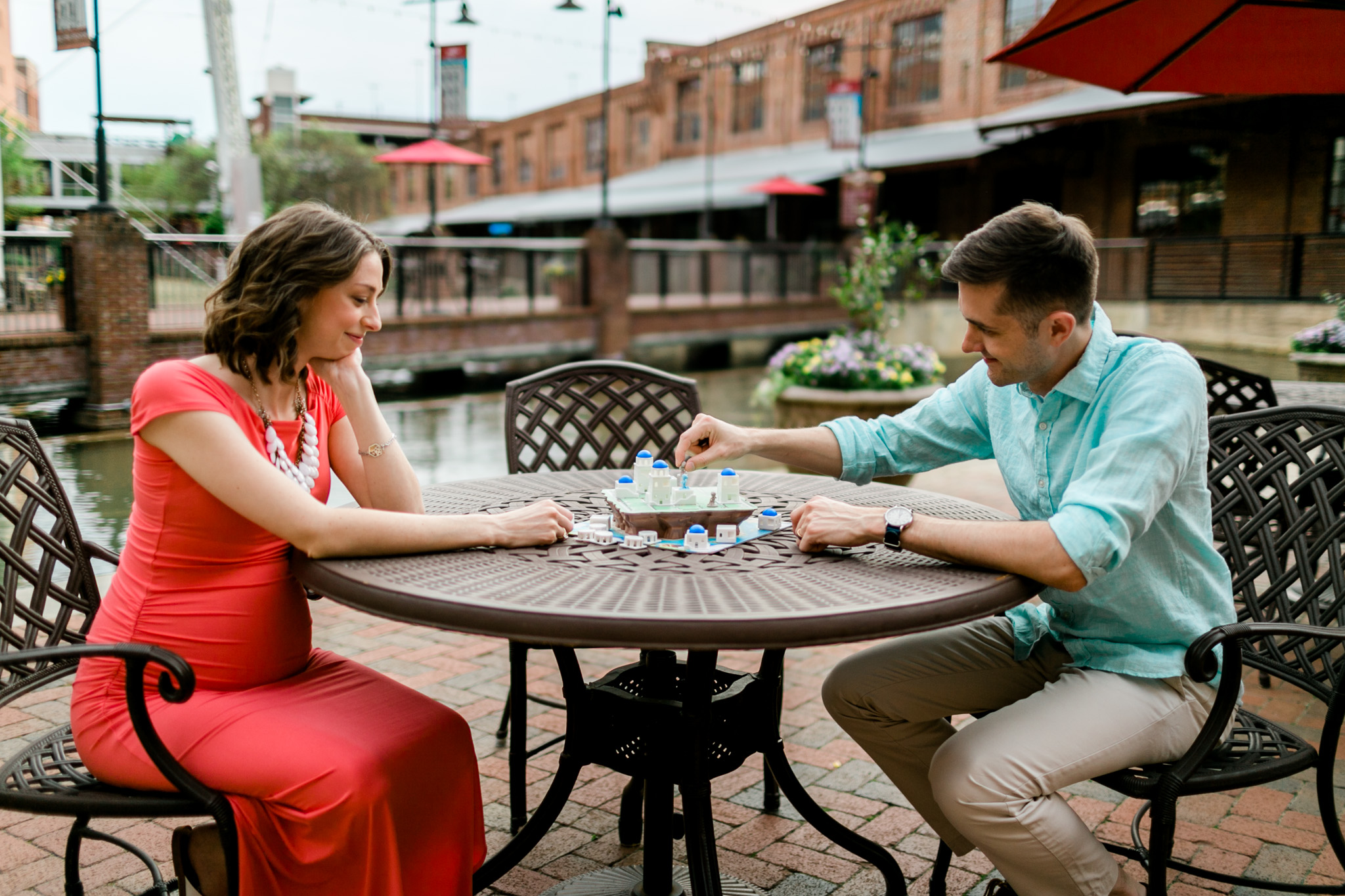 Couple playing board game outside | Durham Photographer | By G. Lin Photography