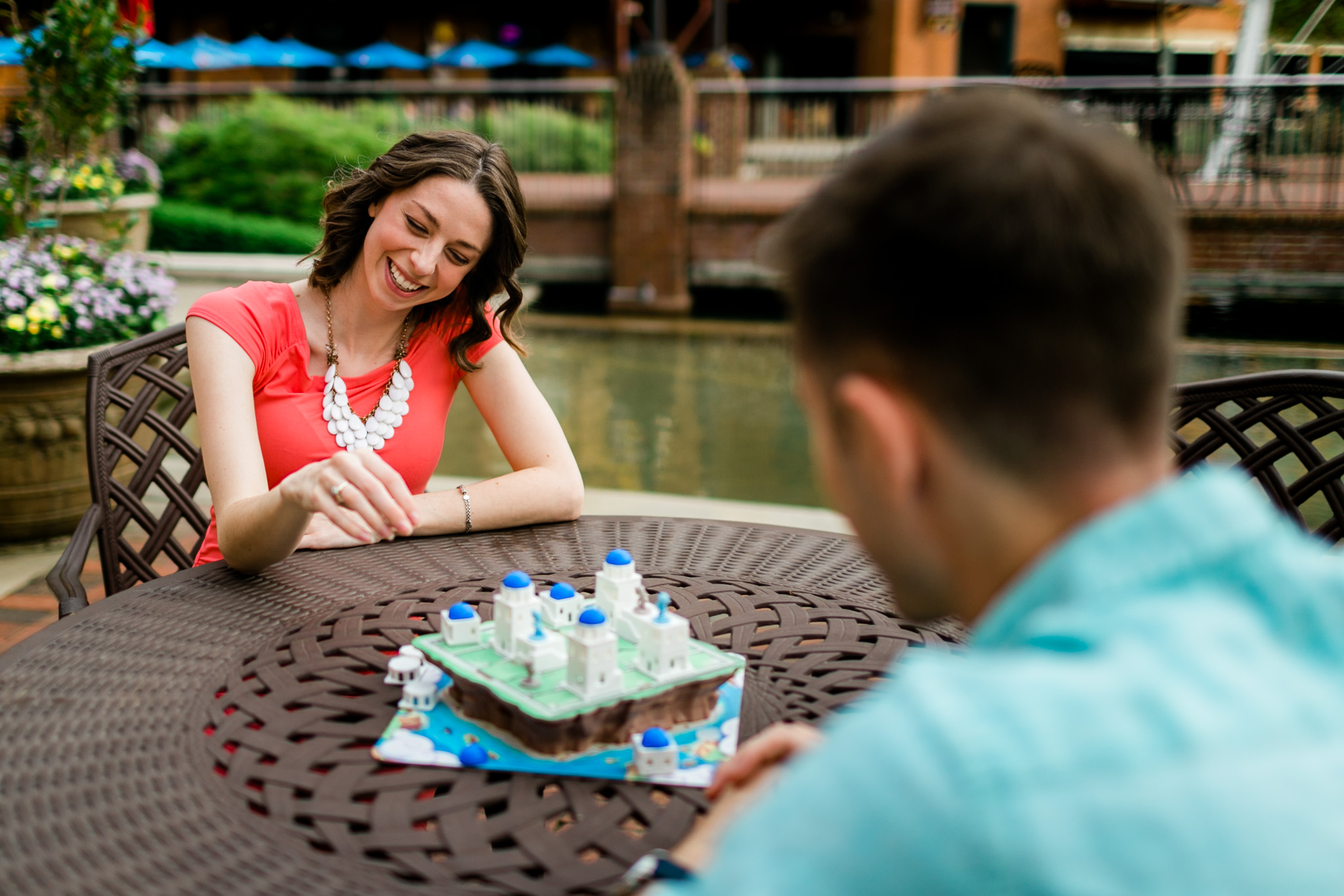 Couple playing board game outside | | Durham Photographer | By G. Lin Photography